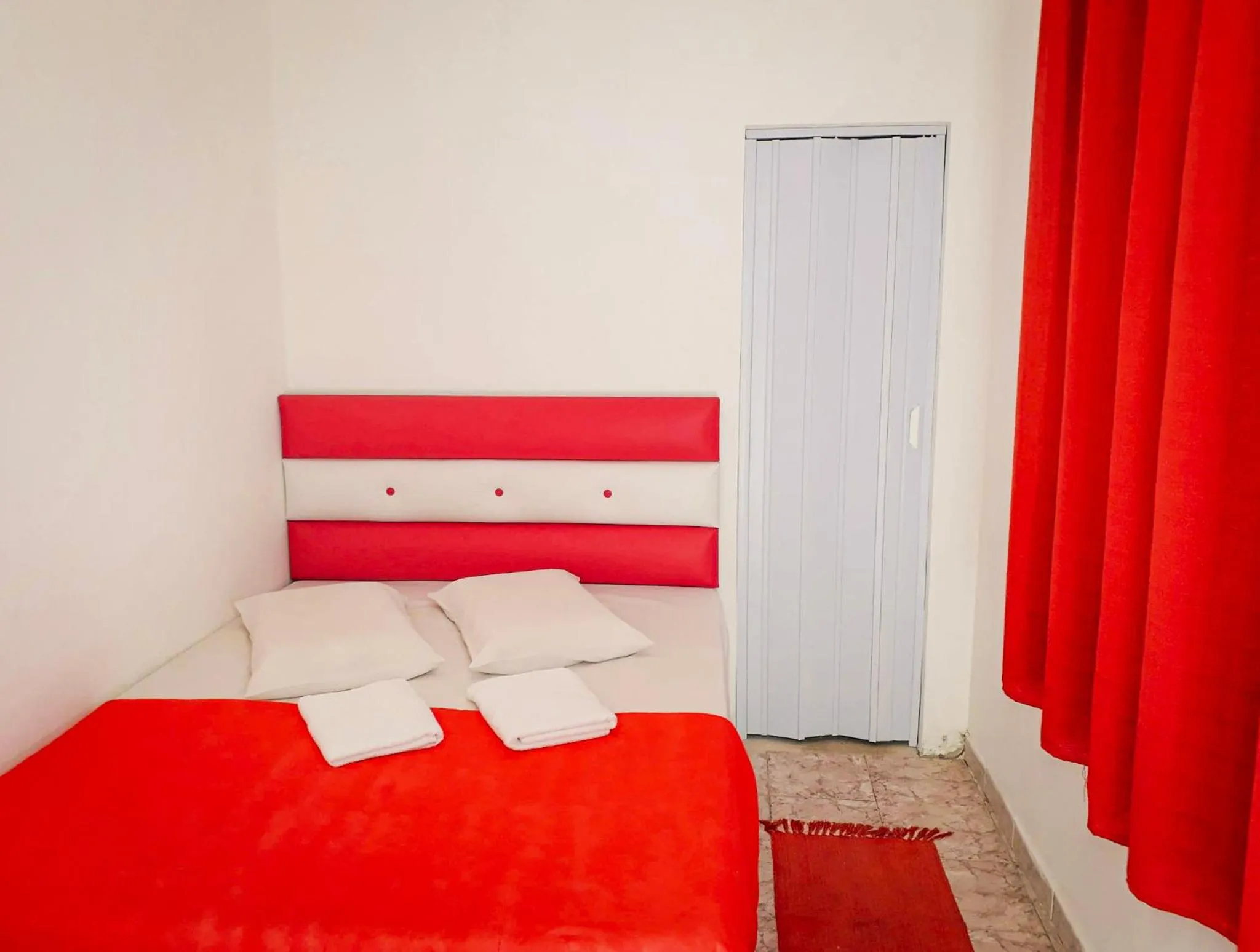 Bed in Pousada Peruibe 455