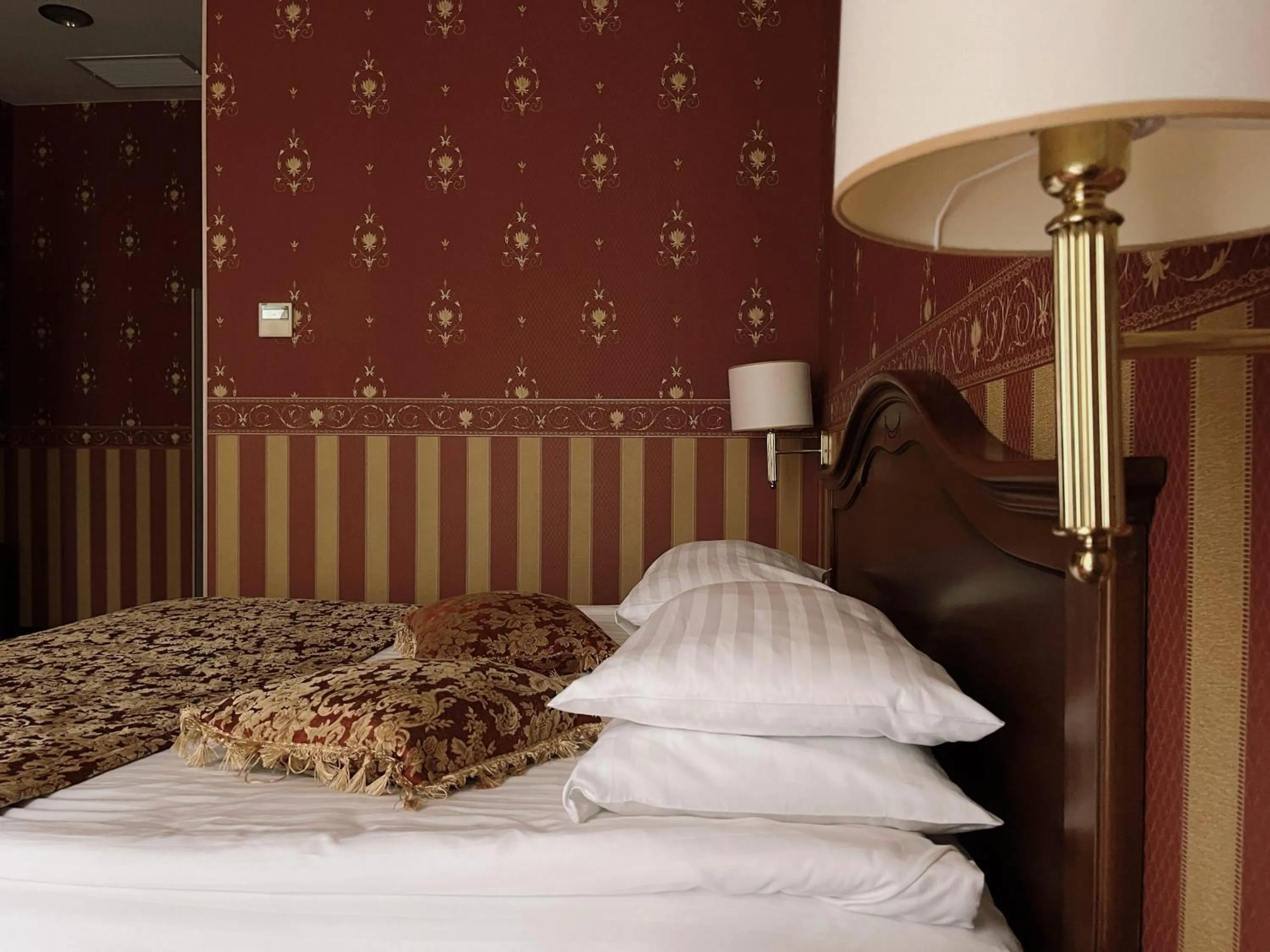 Bed in Continental Hotel