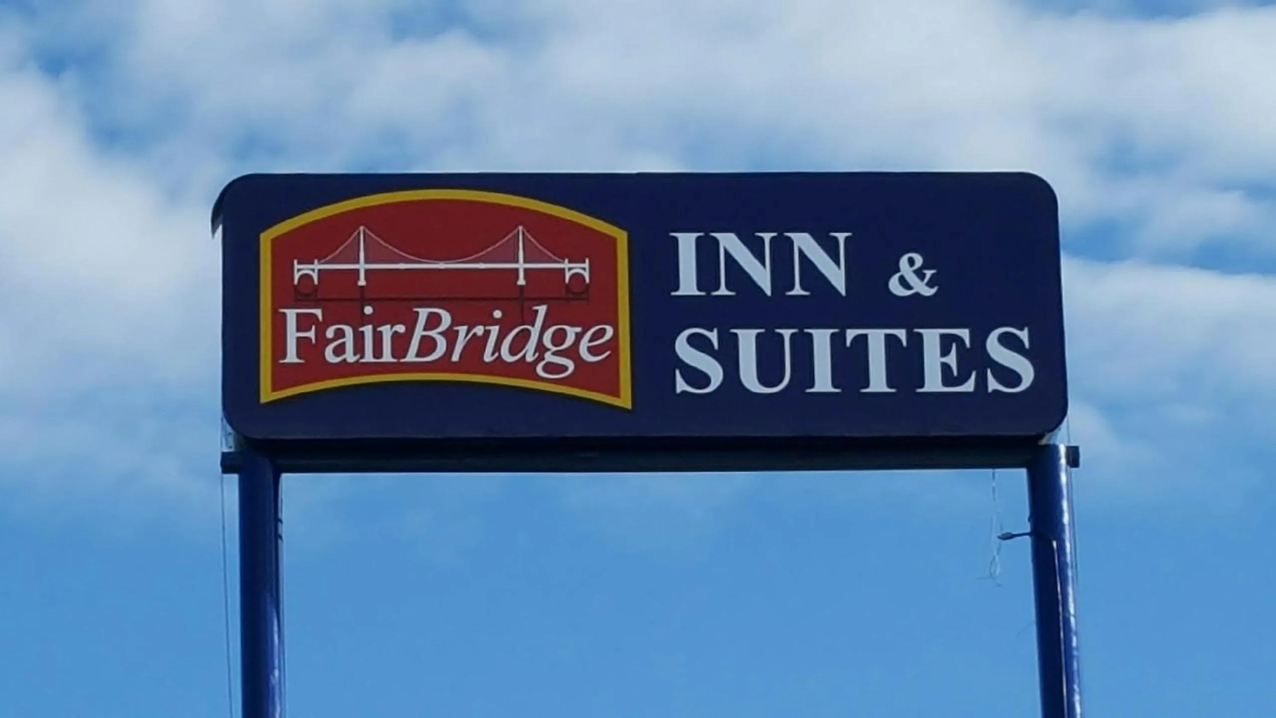 Property logo or sign in FairBridge Extended Stay, a Kitchenette Hotel