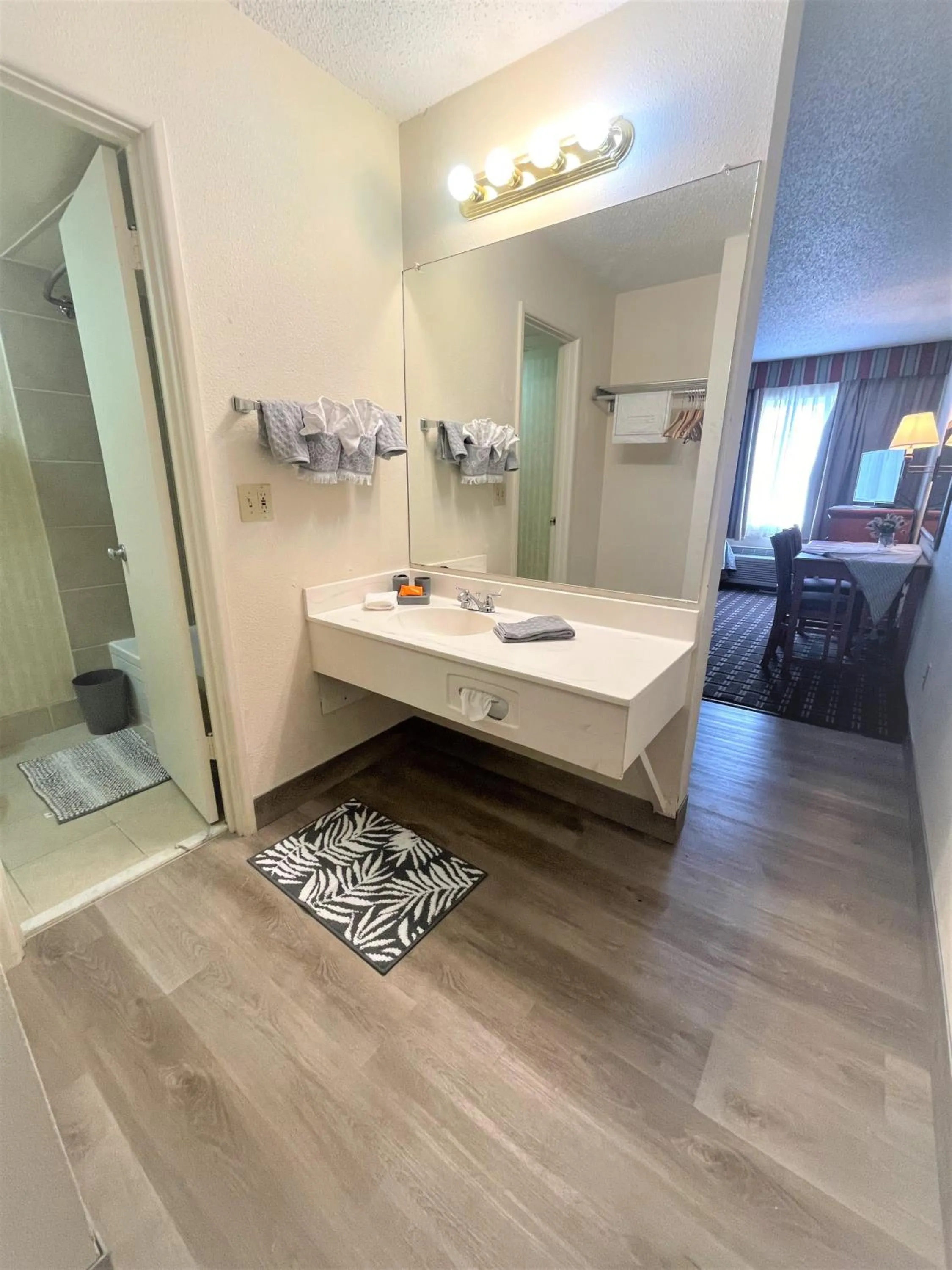 Photo of the whole room, Bed in FairBridge Extended Stay, a Kitchenette Hotel