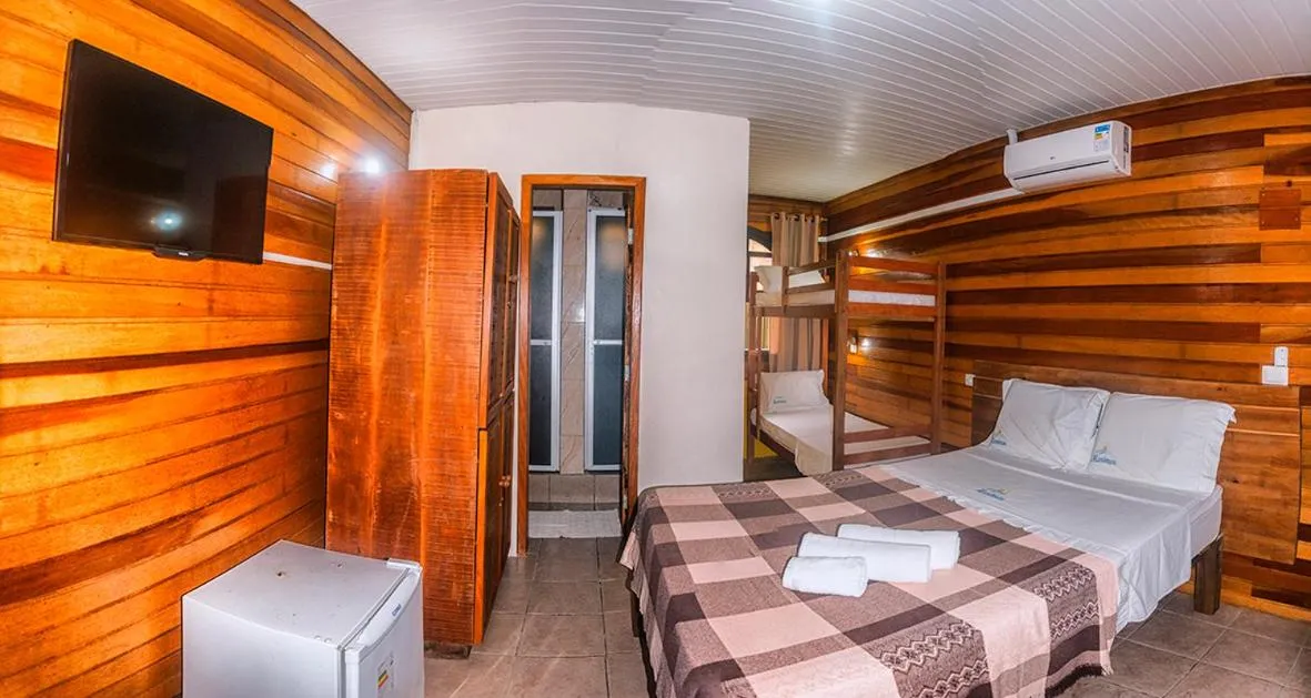 Bed in Pousada Marimar