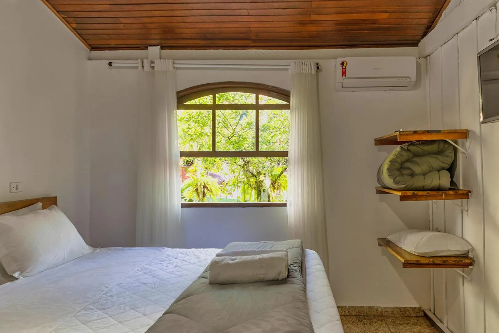 Bed in Pousada Marimar