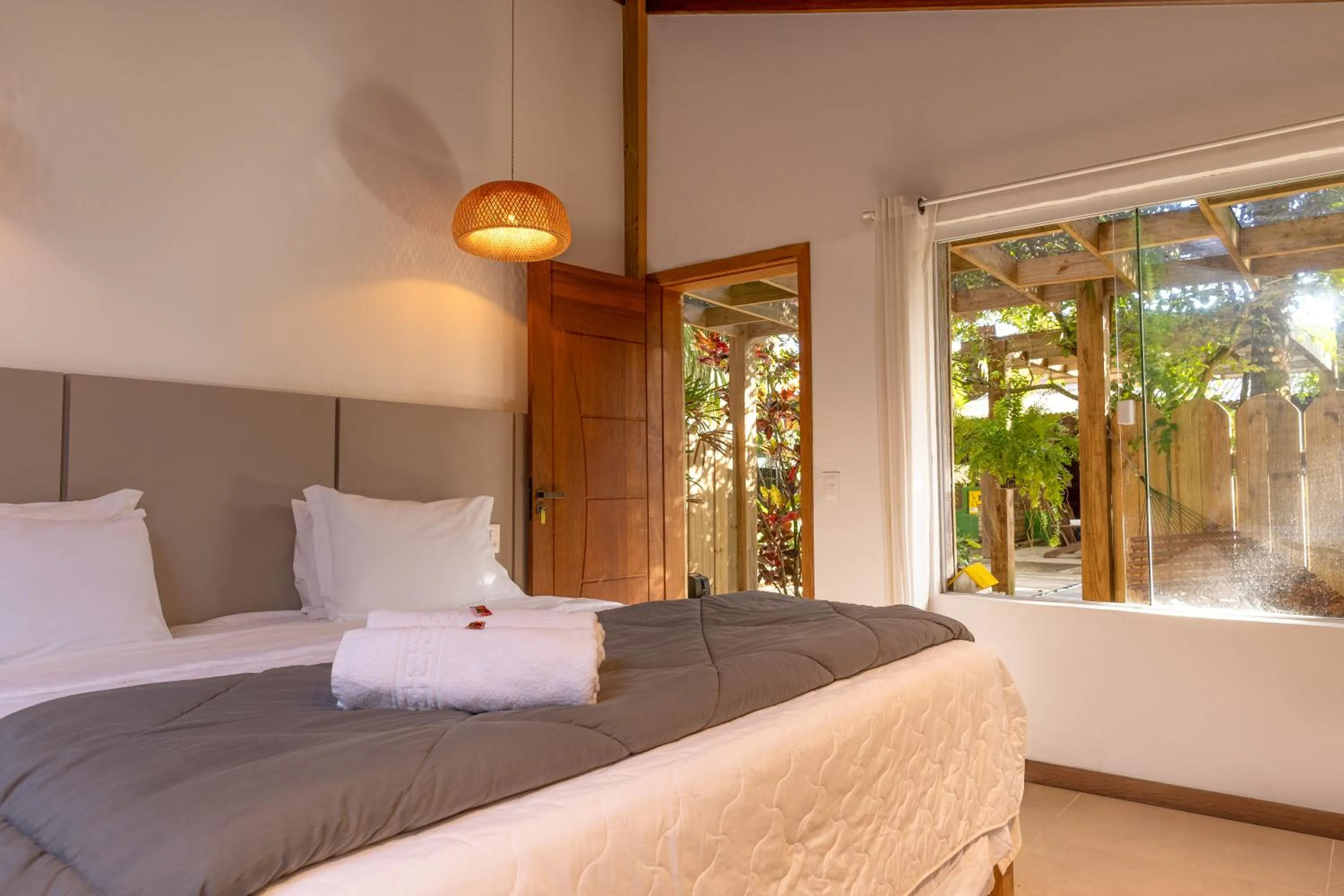 Bed in Pousada Marimar