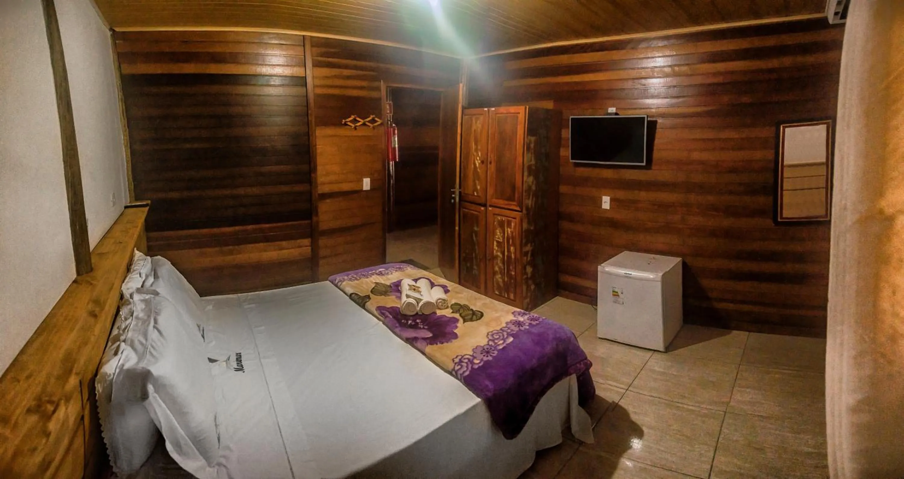 Bed in Pousada Marimar