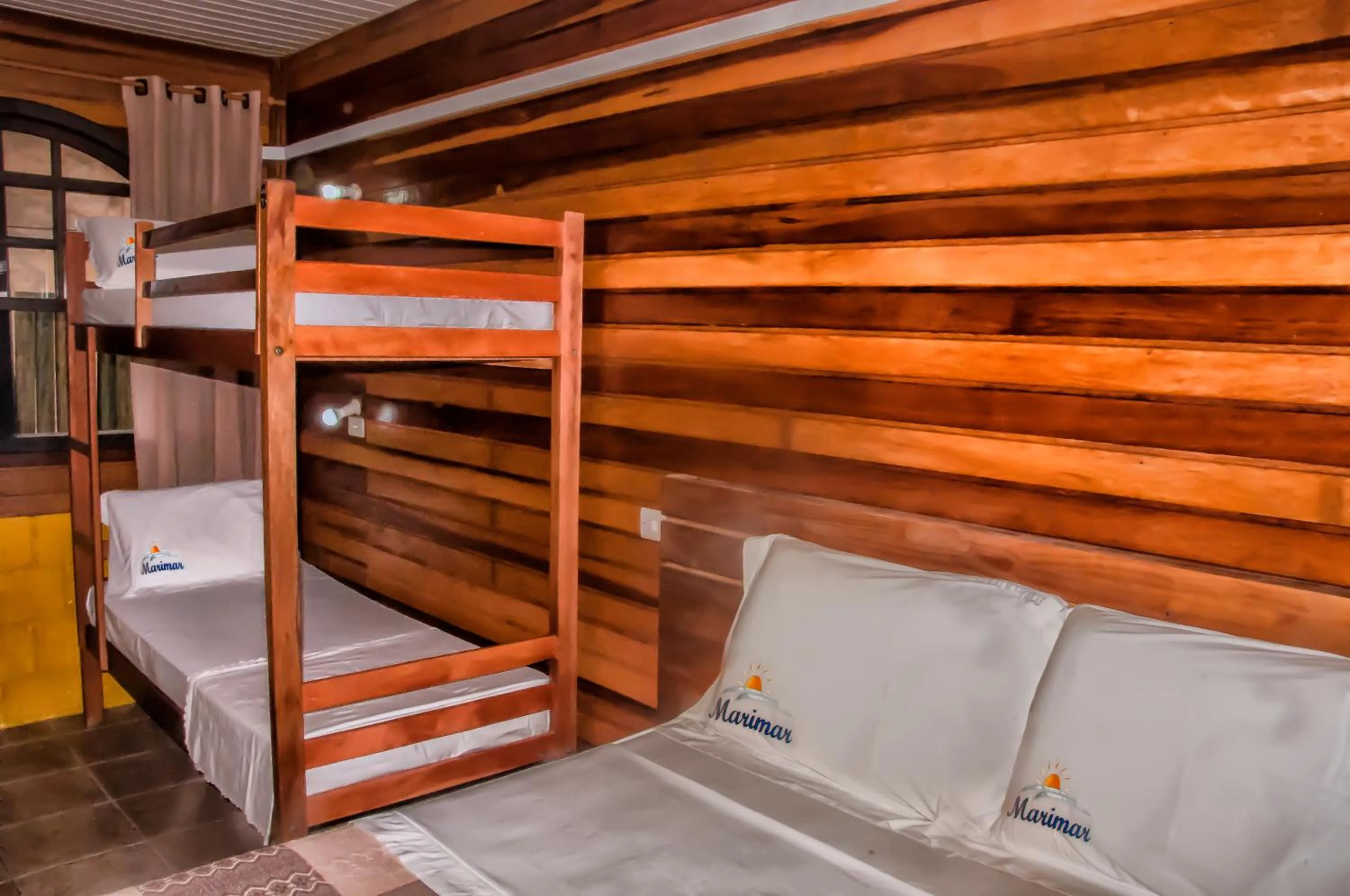 Bed in Pousada Marimar