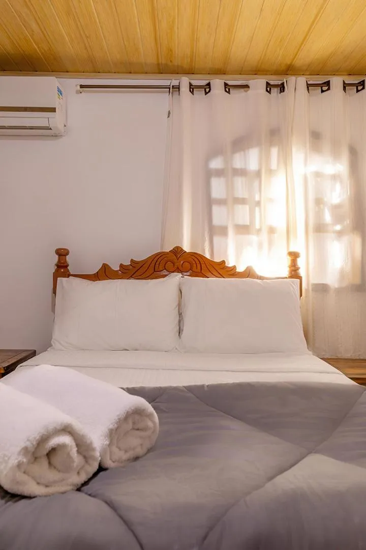 Bed in Pousada Marimar