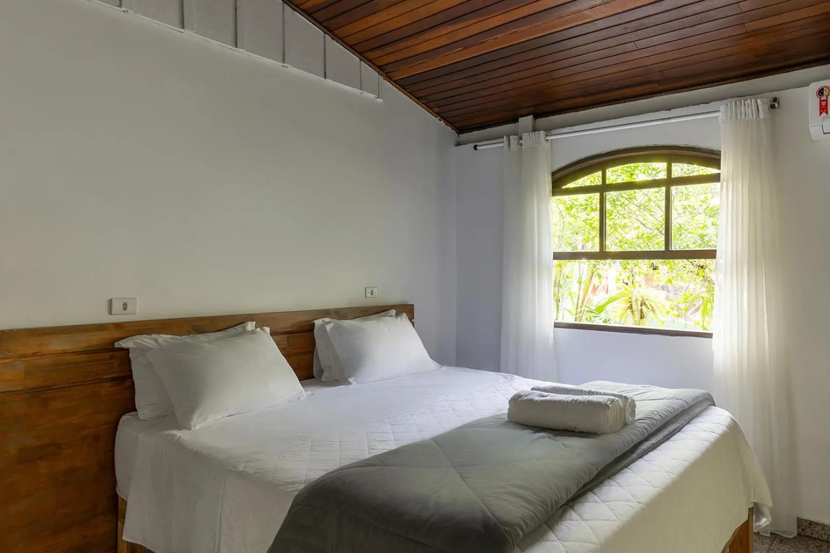 Bed in Pousada Marimar