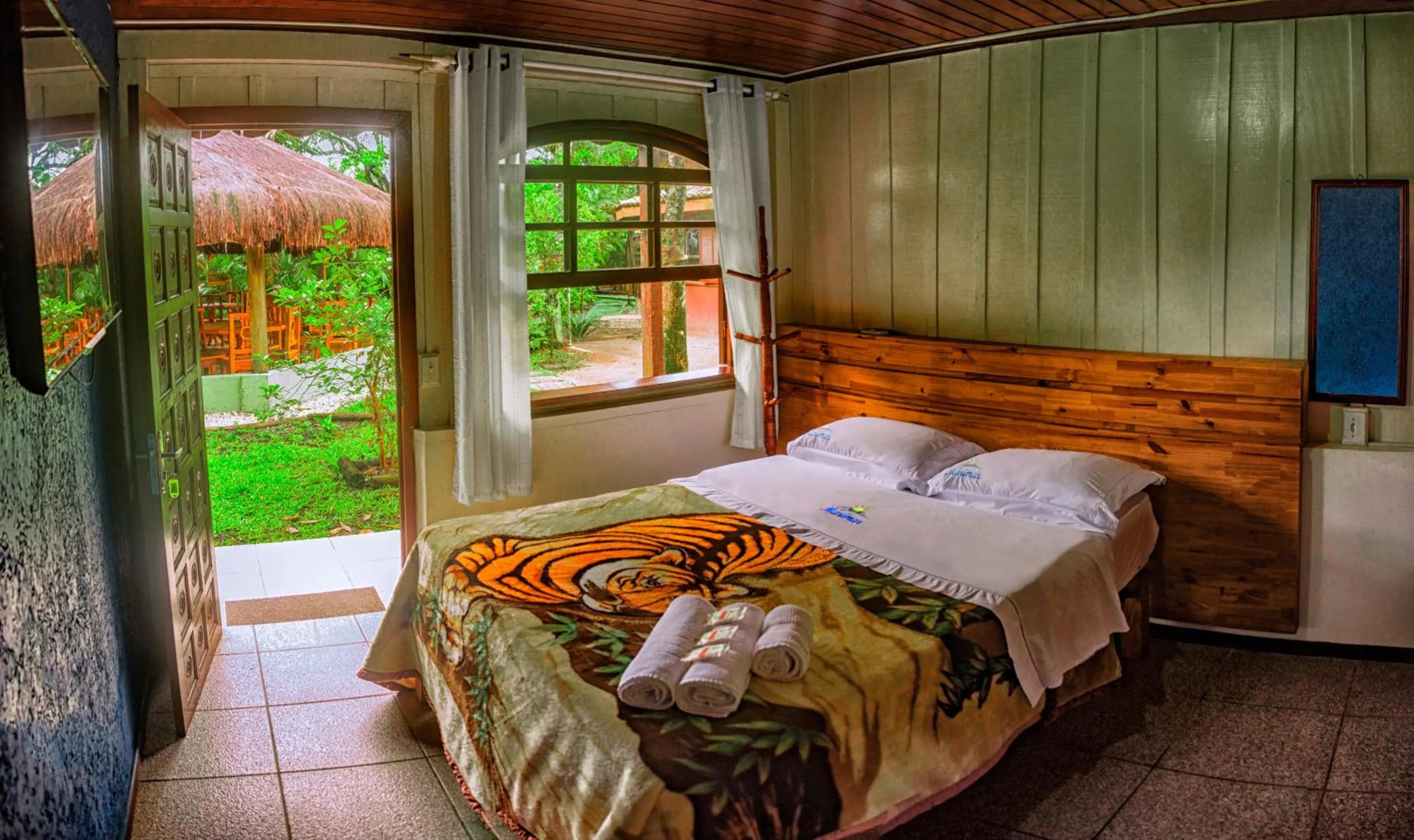 Garden view, Bed in Pousada Marimar