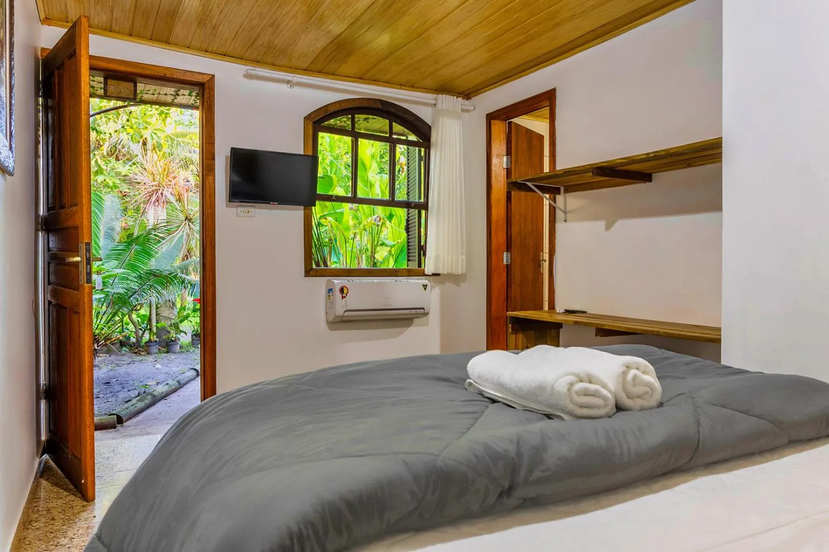 Bed in Pousada Marimar