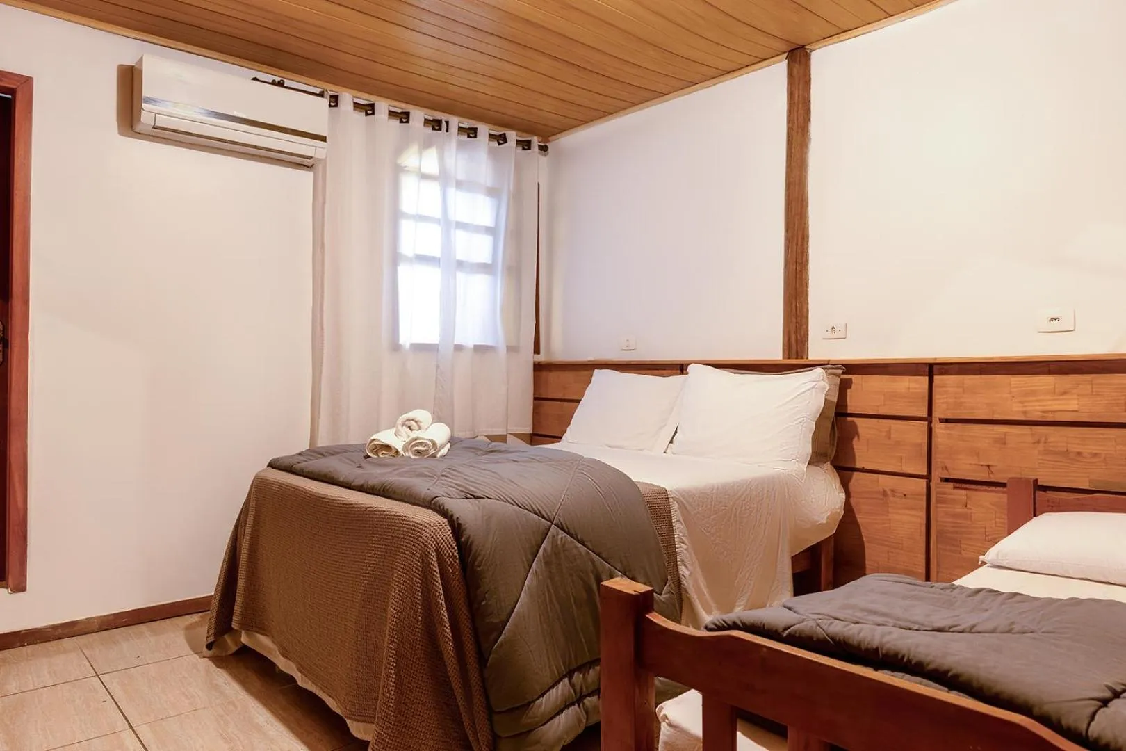 Bed in Pousada Marimar