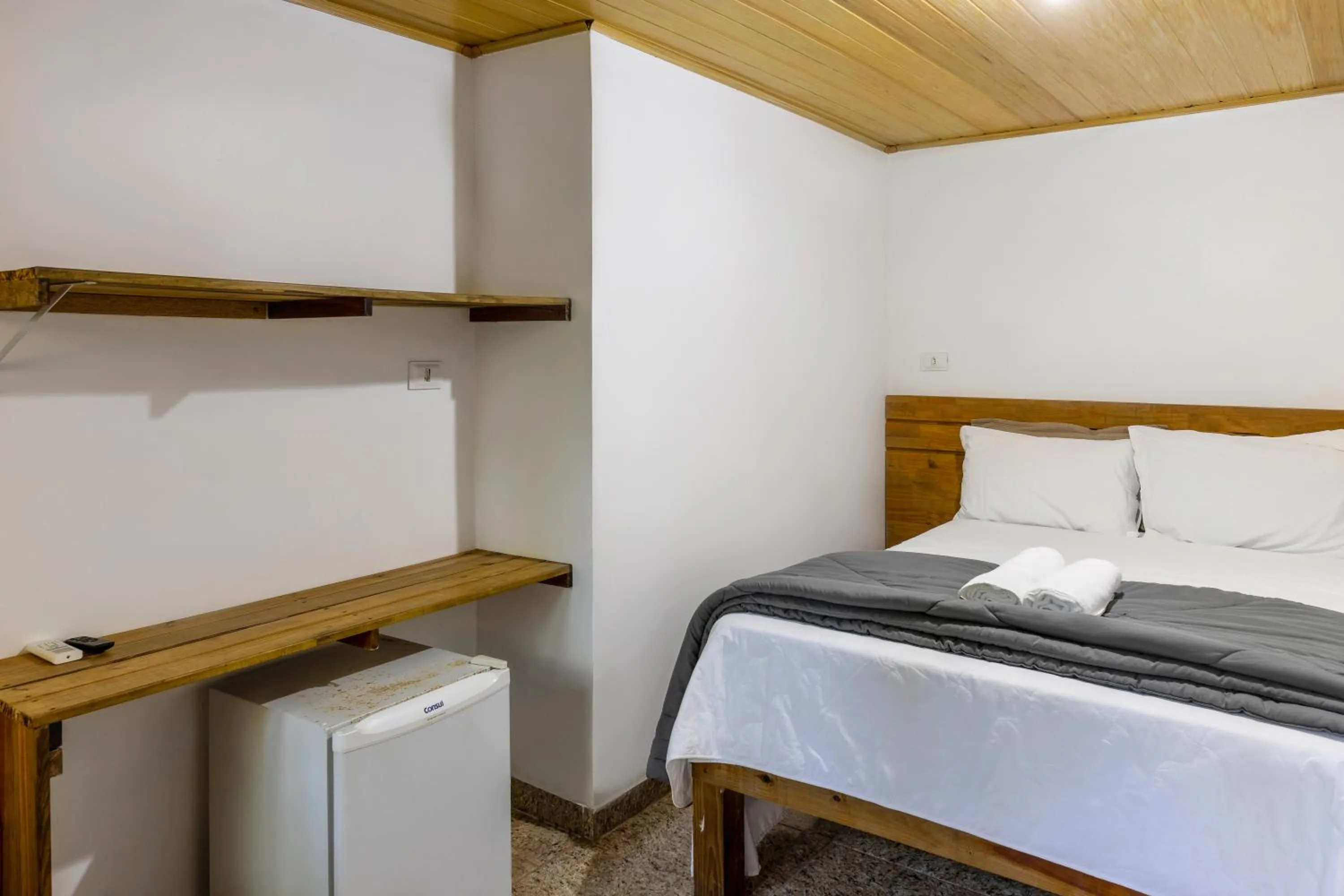 Bed in Pousada Marimar