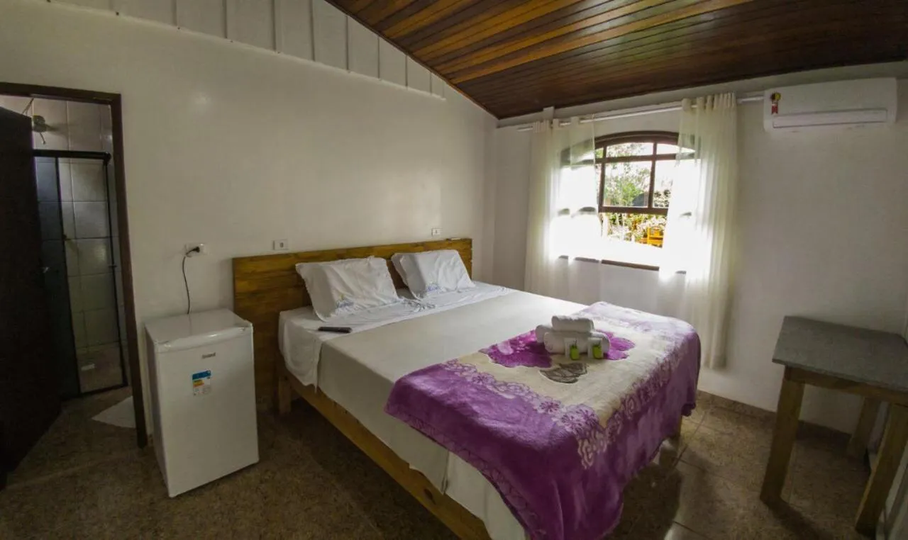 Bed in Pousada Marimar