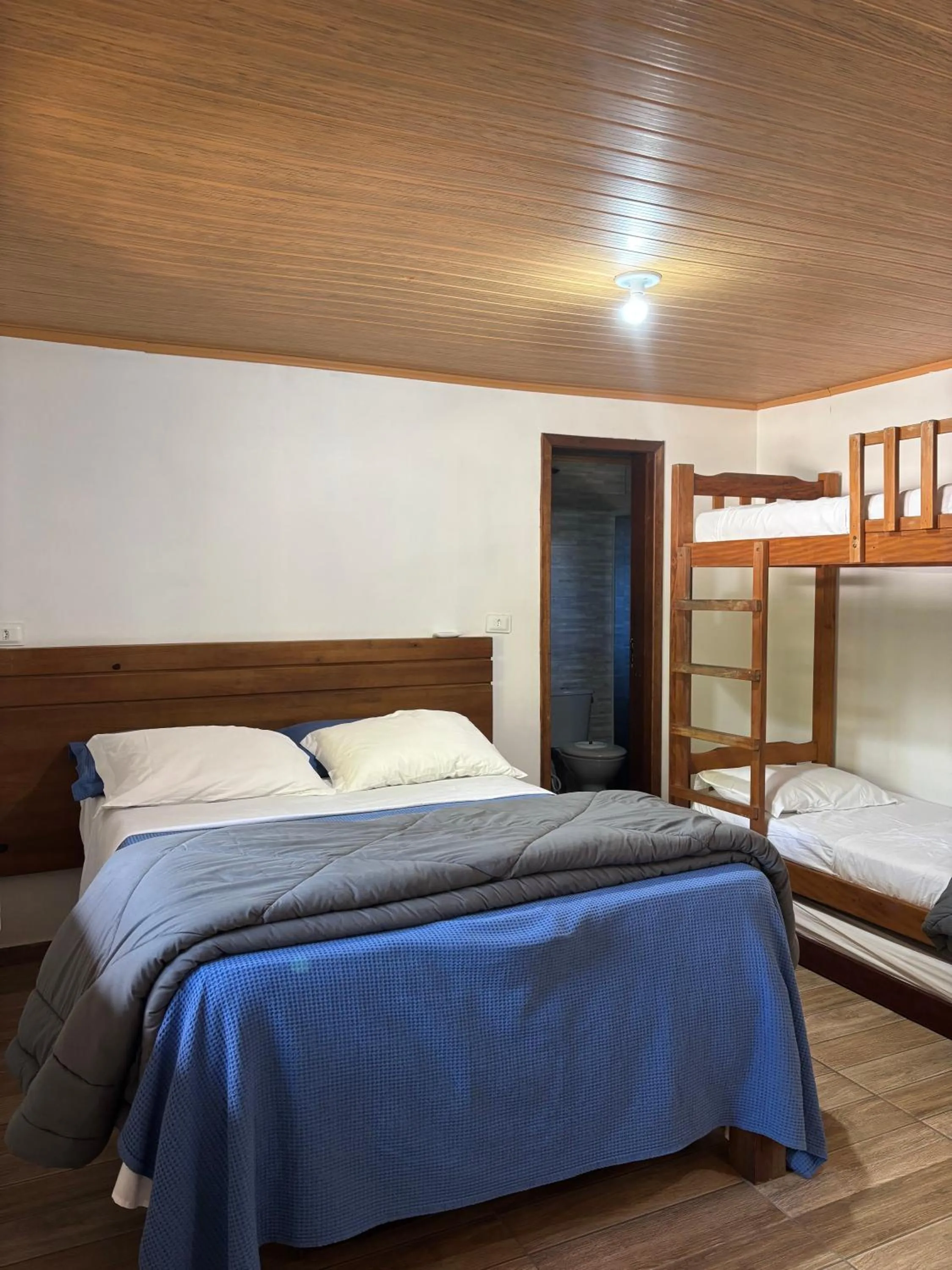 Bed in Pousada Marimar