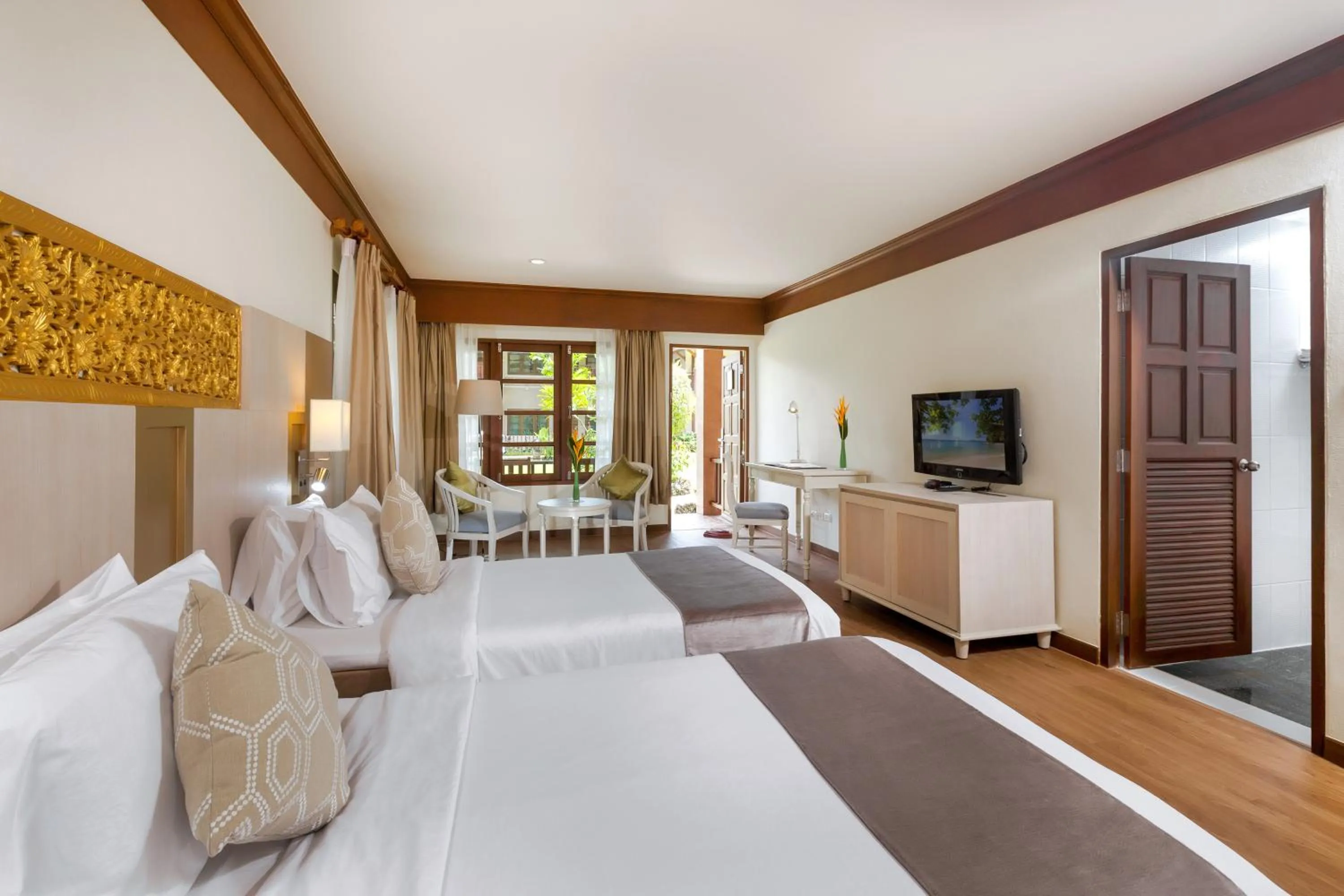 Bed in Best Western Premier Bangtao Beach Resort & Spa