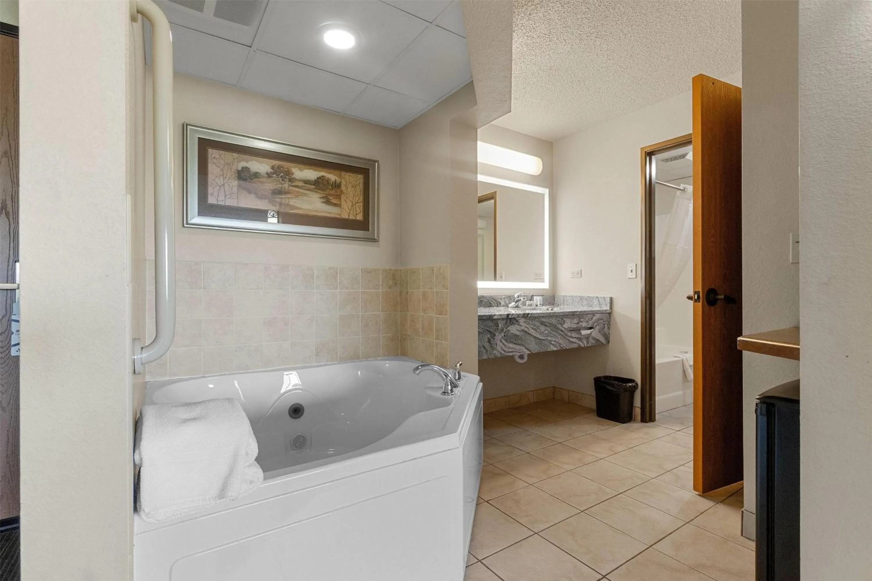 Bathroom in AmericInn by Wyndham Green Bay East