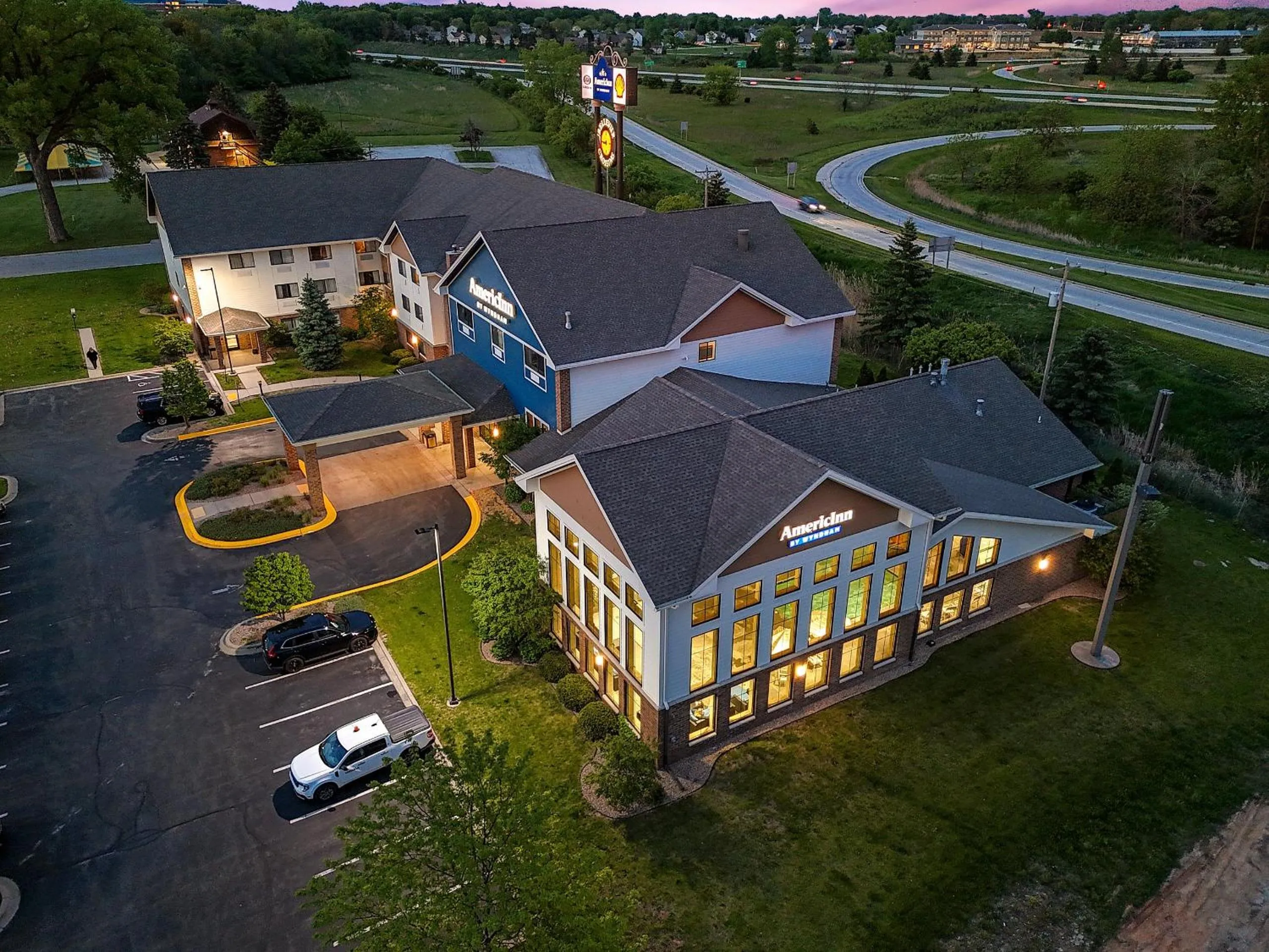 Property building in AmericInn by Wyndham Green Bay East