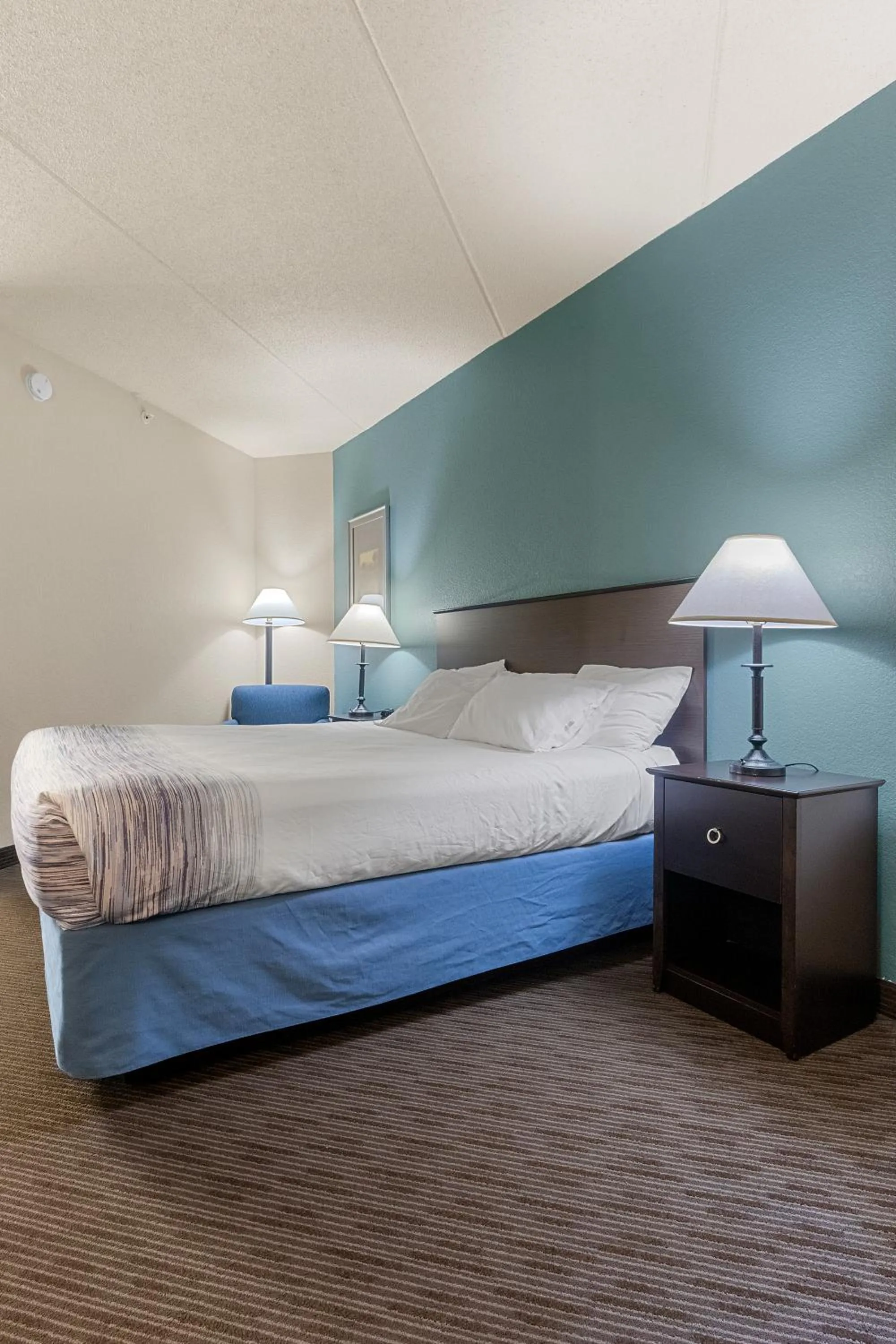 Bed in AmericInn by Wyndham Green Bay East