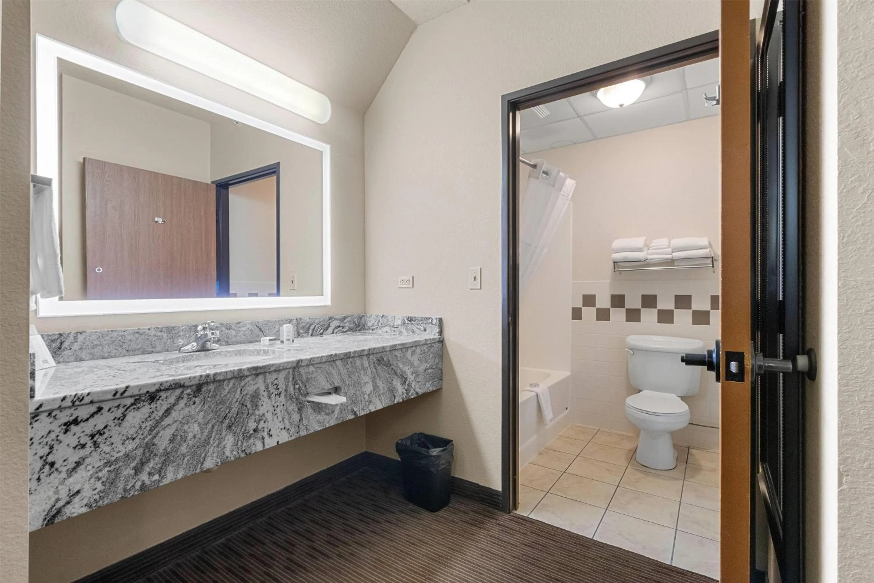 Bathroom in AmericInn by Wyndham Green Bay East