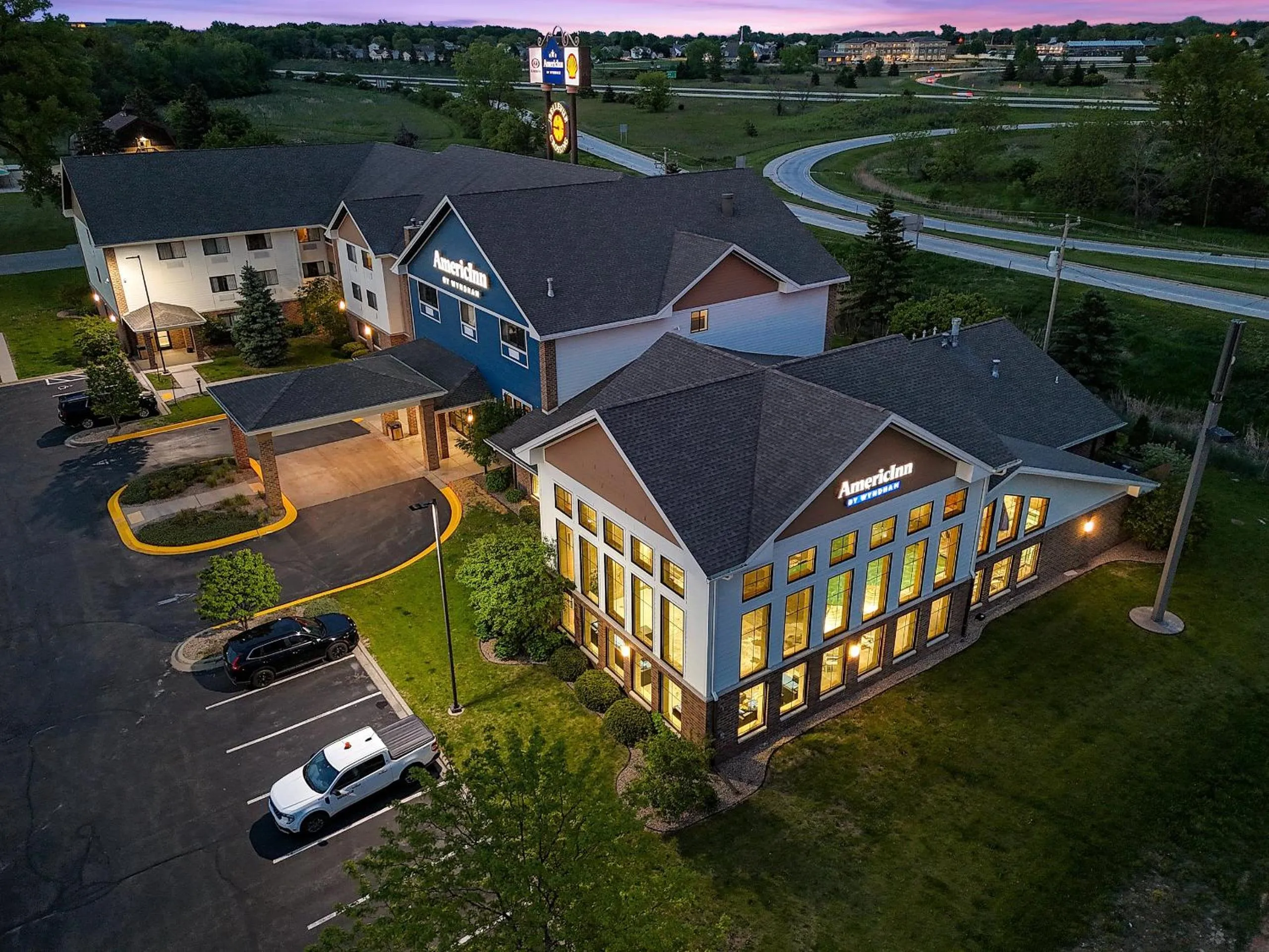 Property building in AmericInn by Wyndham Green Bay East