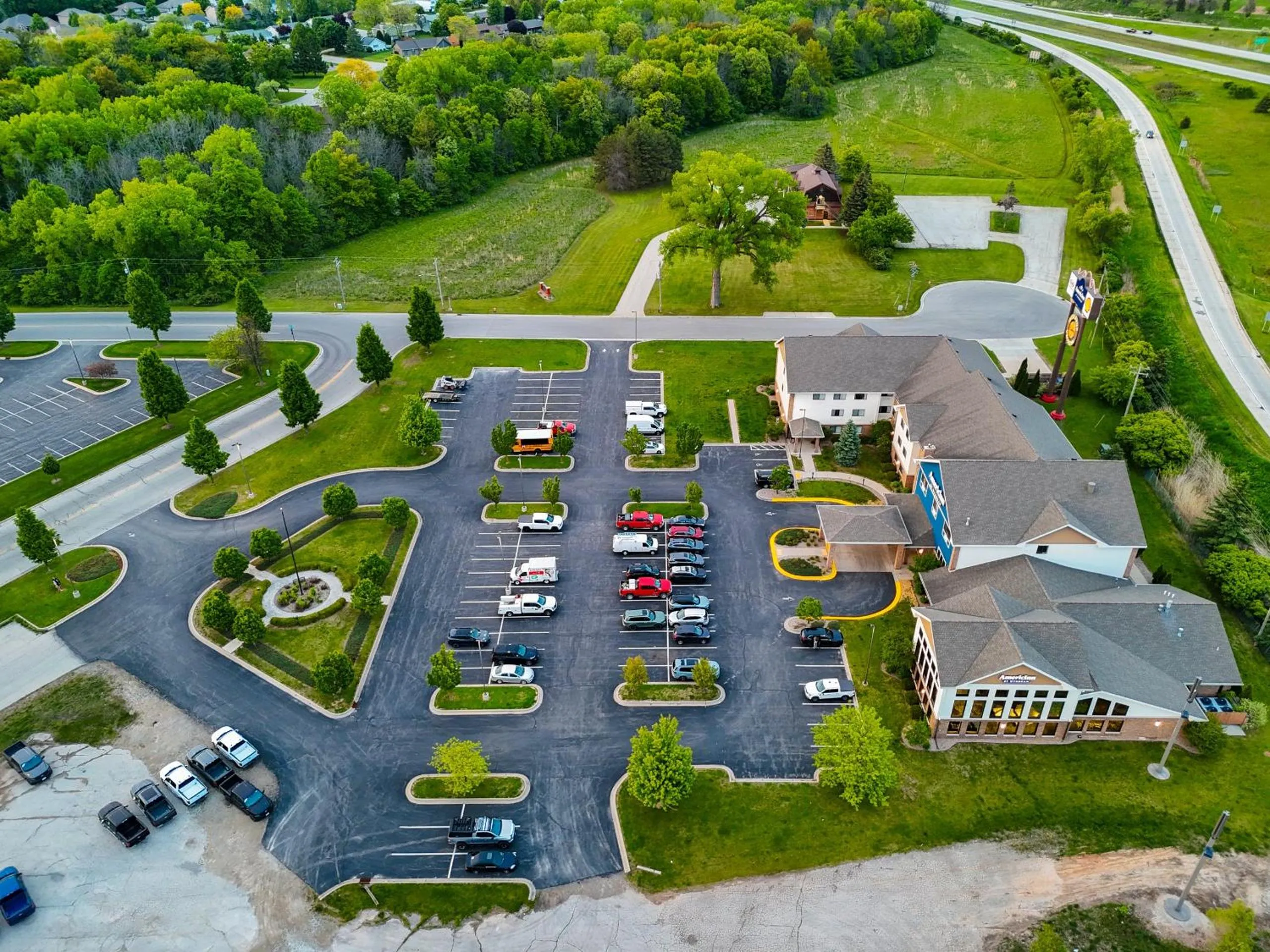 Property building in AmericInn by Wyndham Green Bay East