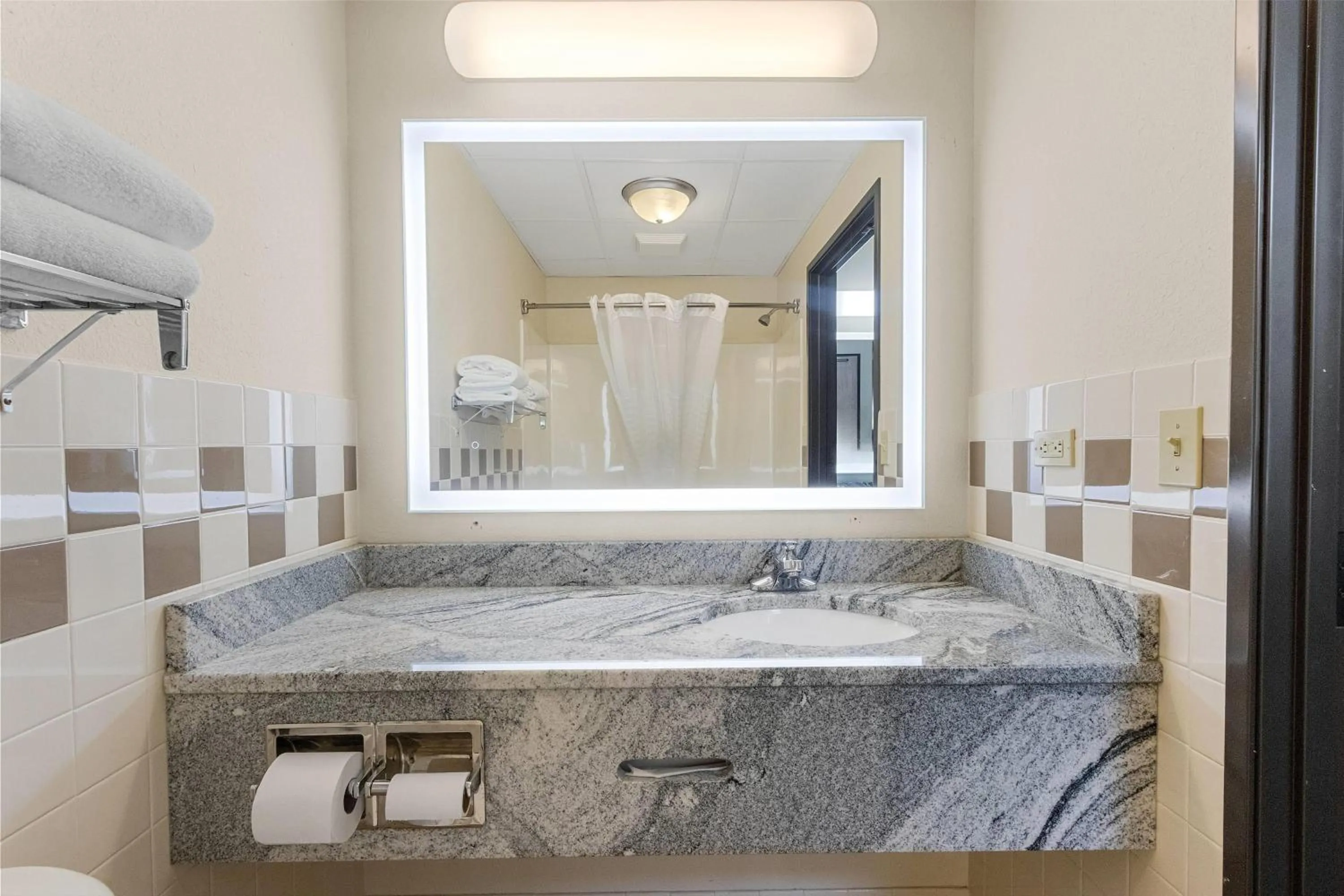 Bathroom in AmericInn by Wyndham Green Bay East