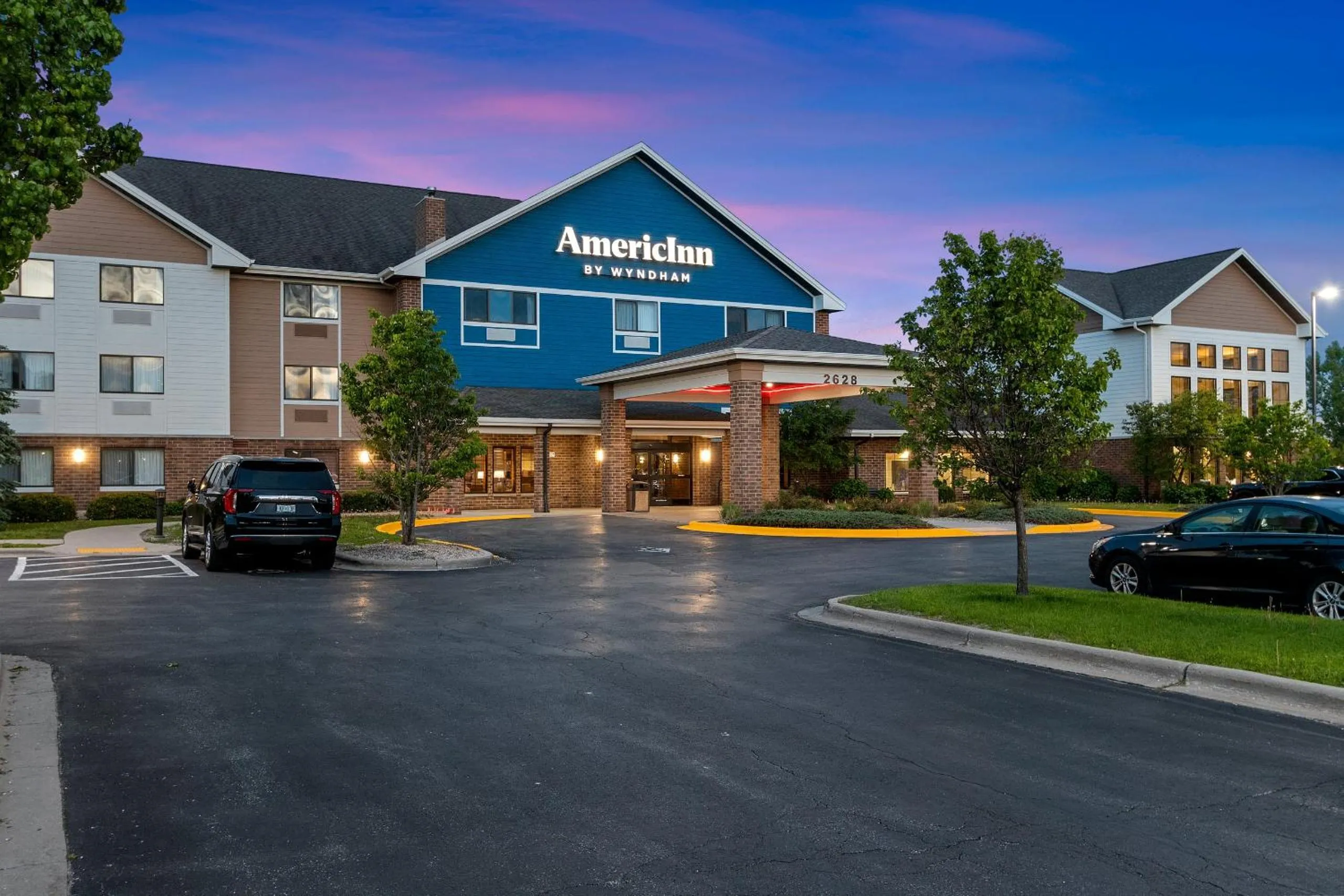 Property building in AmericInn by Wyndham Green Bay East