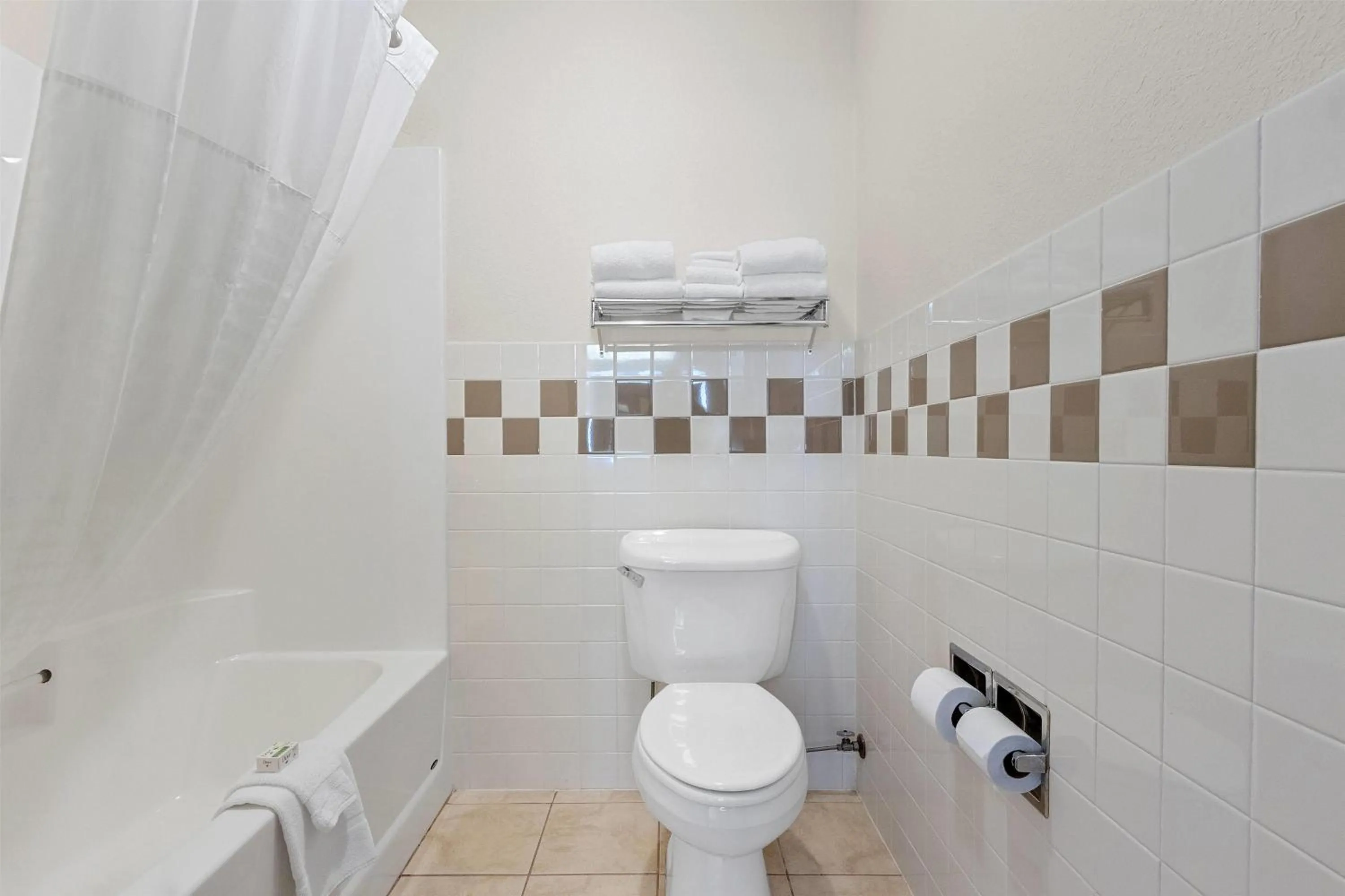 Bathroom in AmericInn by Wyndham Green Bay East