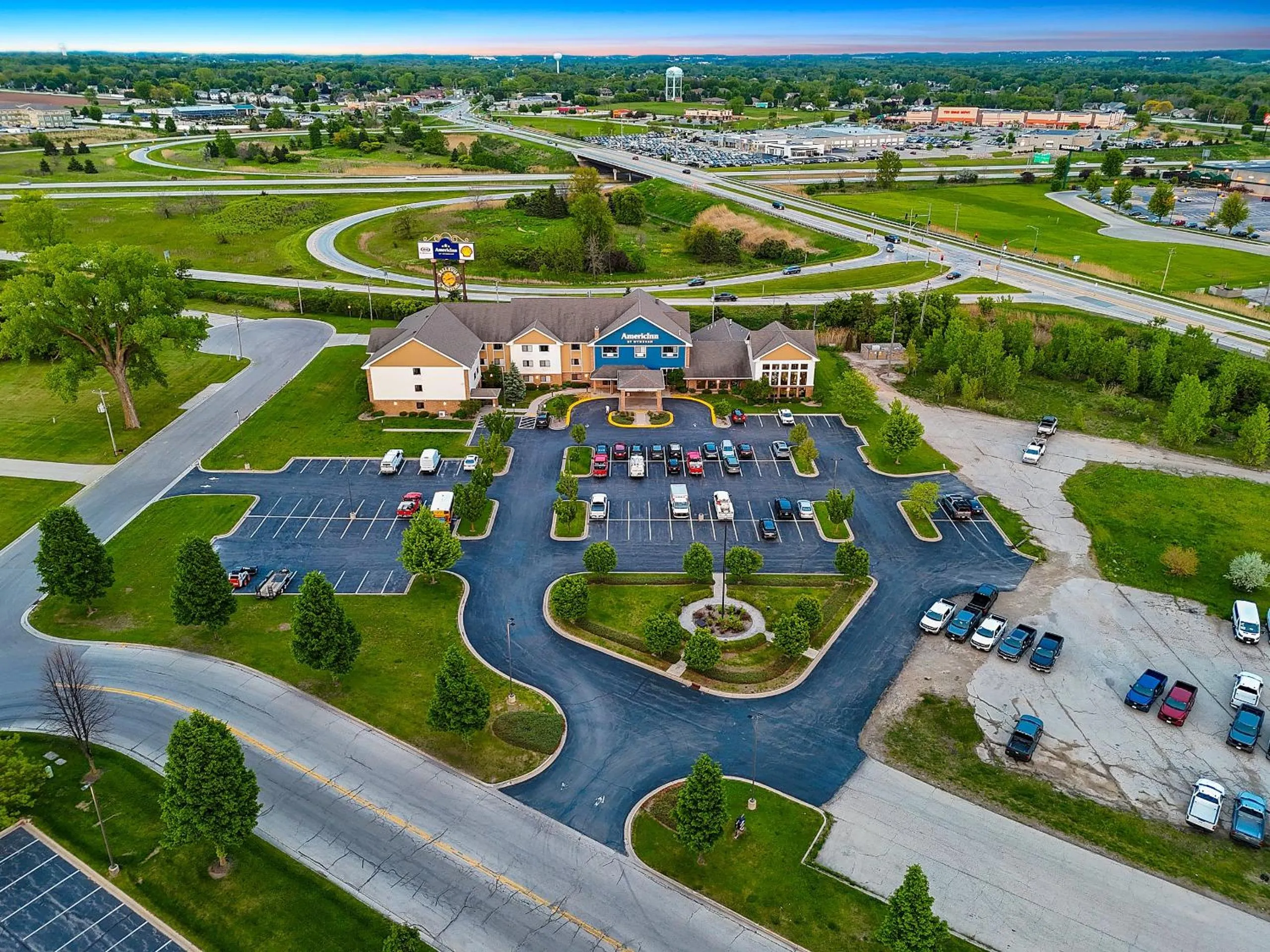 Property building in AmericInn by Wyndham Green Bay East