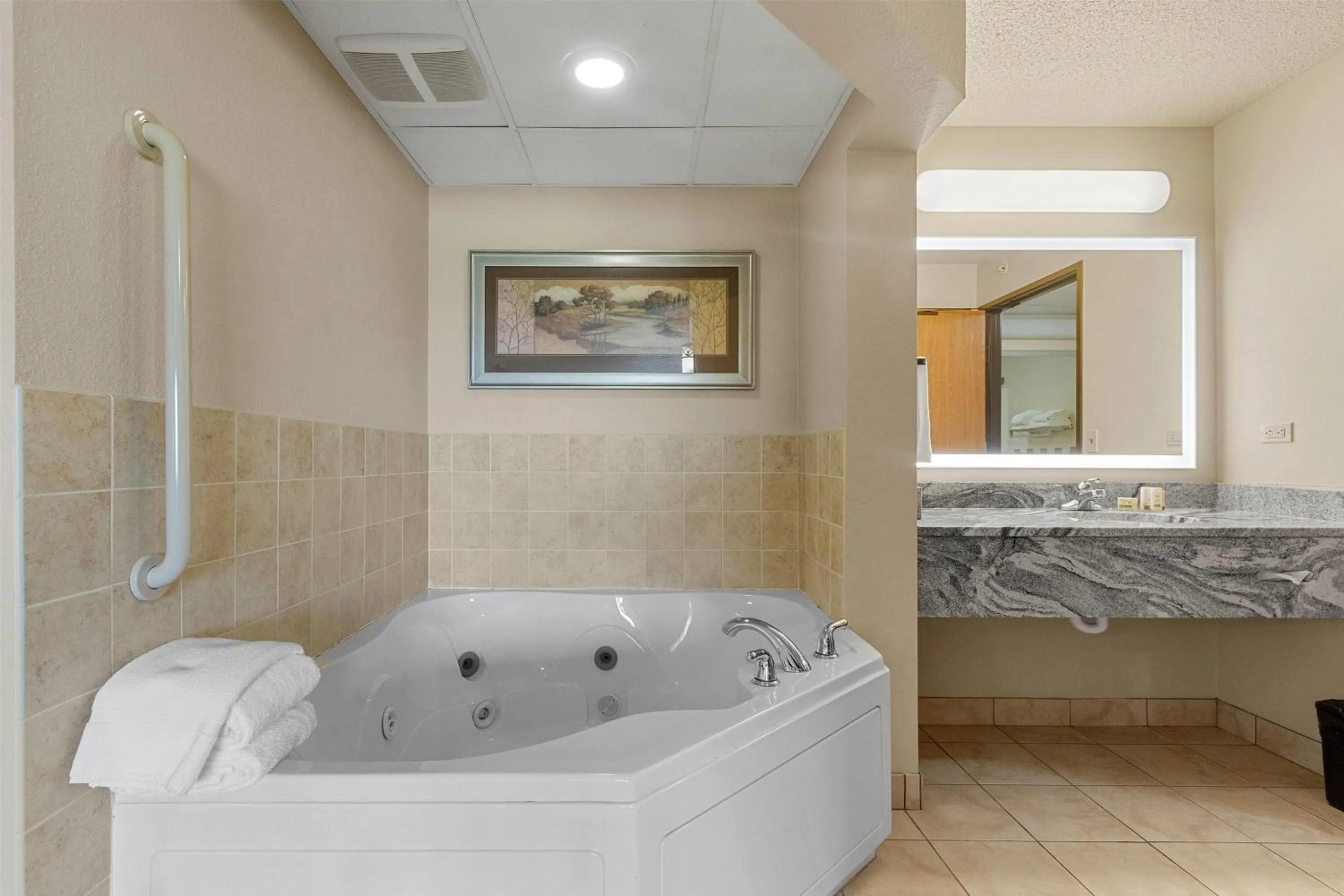 Bathroom in AmericInn by Wyndham Green Bay East