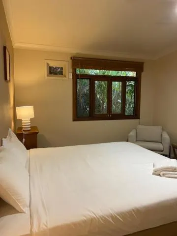 Bed in Tallow Beach Motel