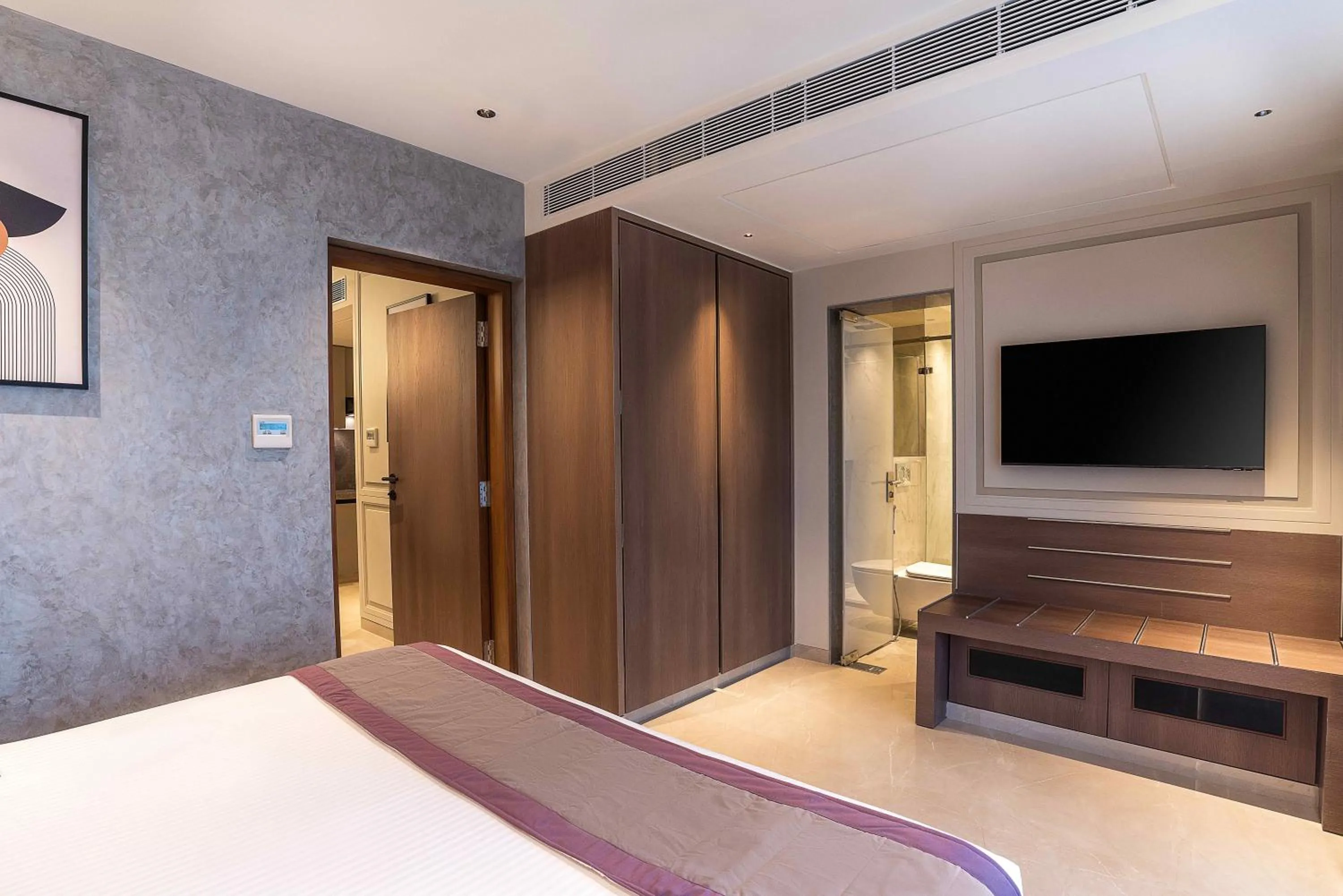 Bed in Grand Residency Hotel & Serviced Apartments