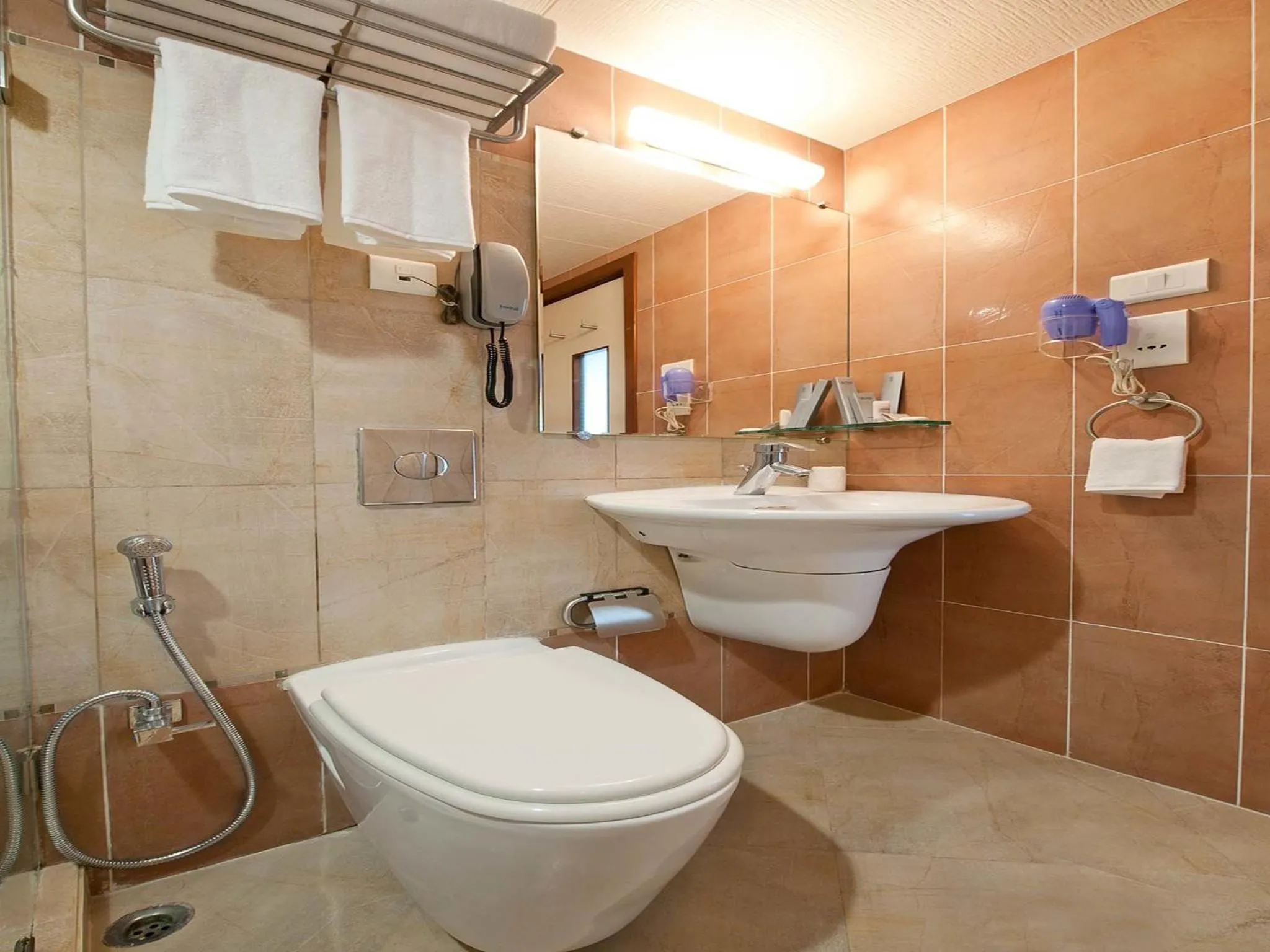 Bathroom in Grand Residency Hotel & Serviced Apartments
