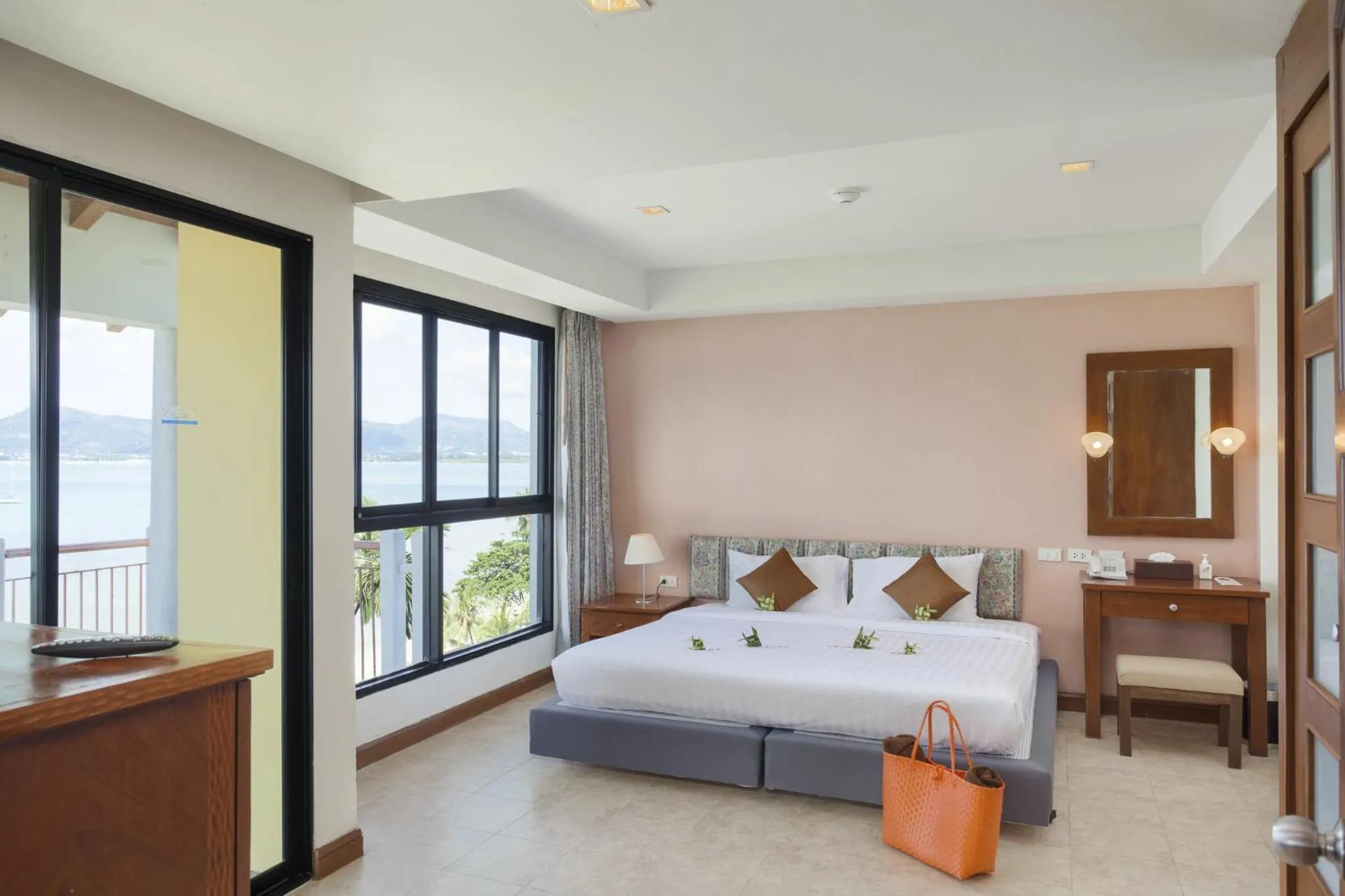 Photo of the whole room, Bed in By The Sea