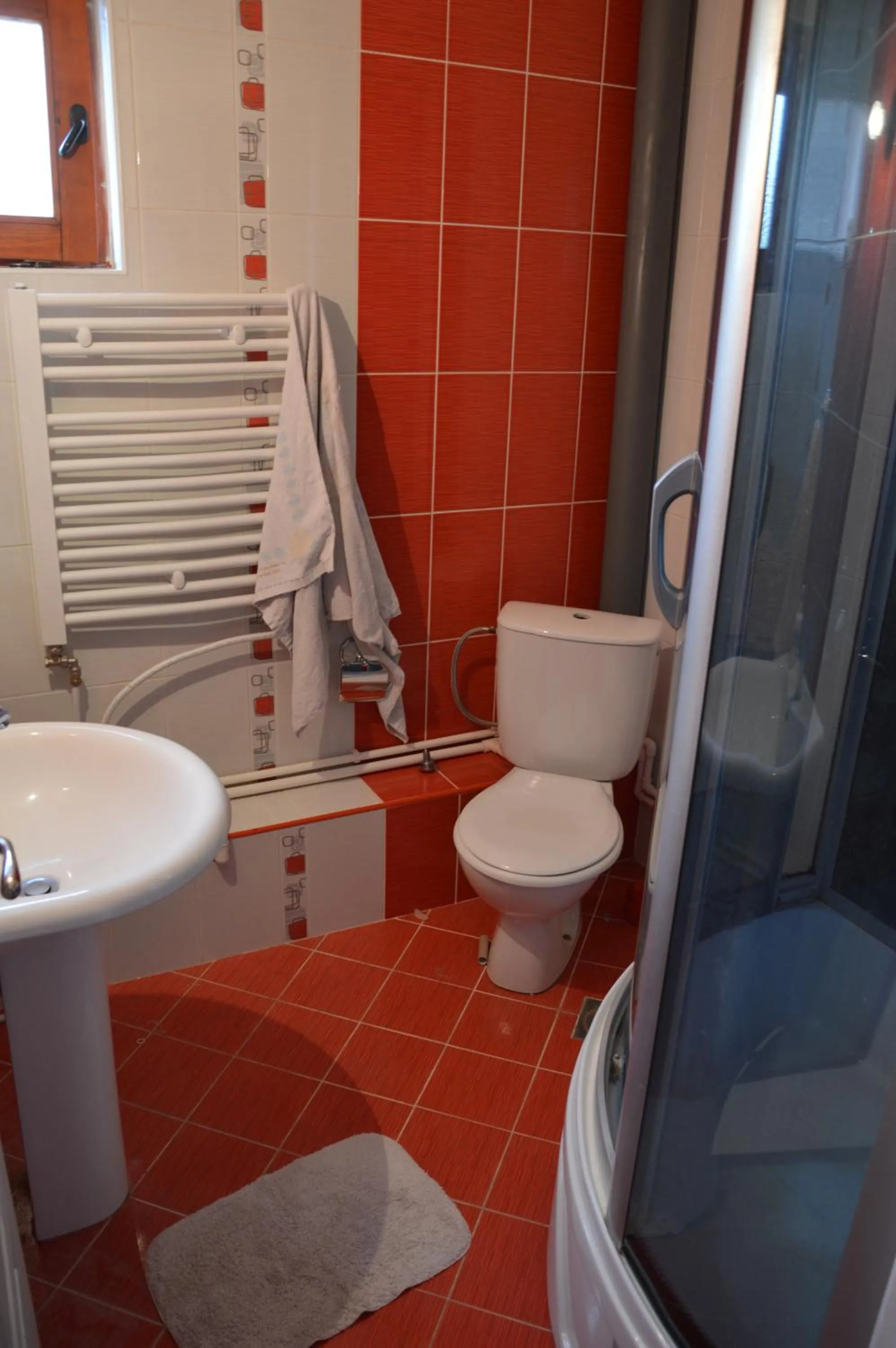 Toilet in Poseidon Apartment