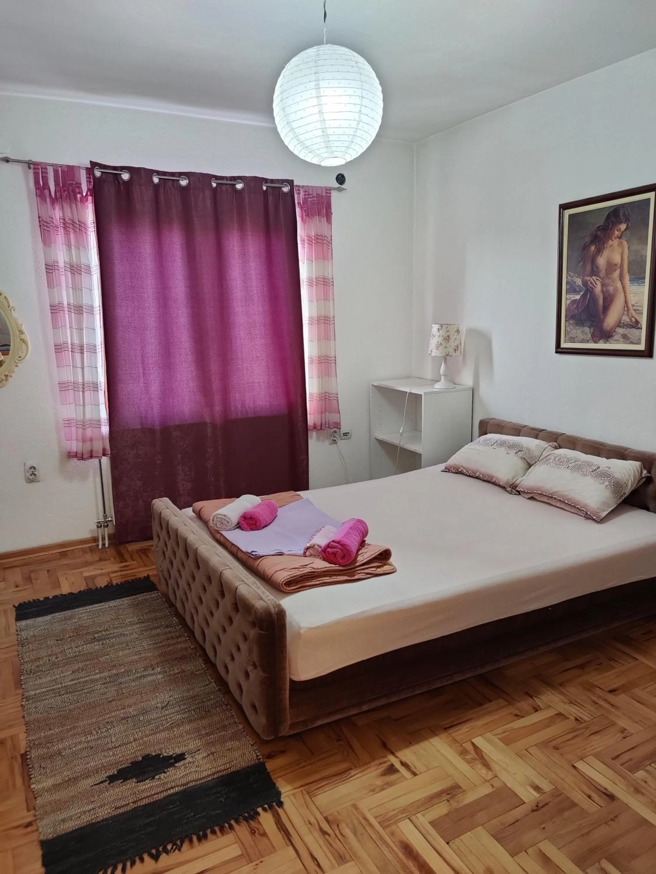 Bed in Poseidon Apartment