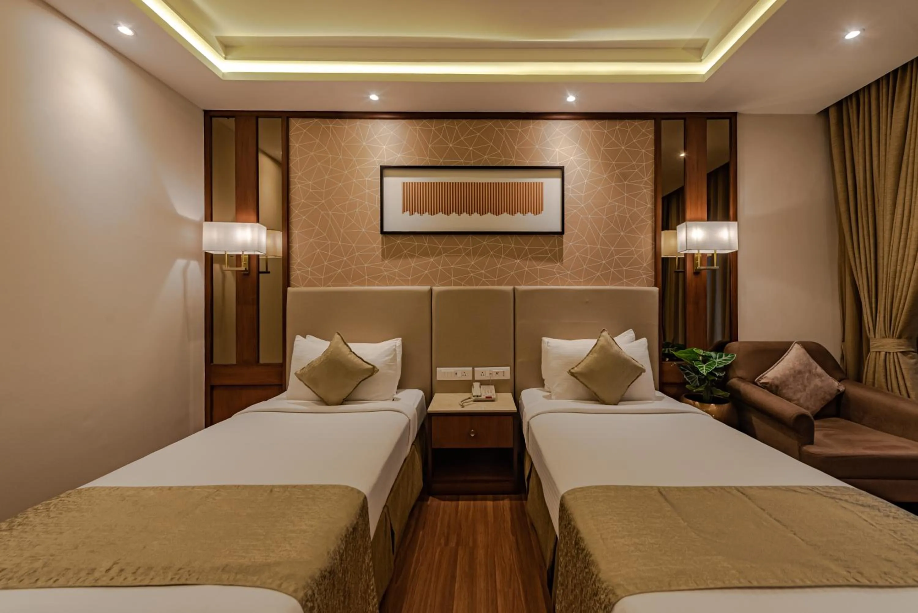 Bed in Goldfinch Hotel Mangalore