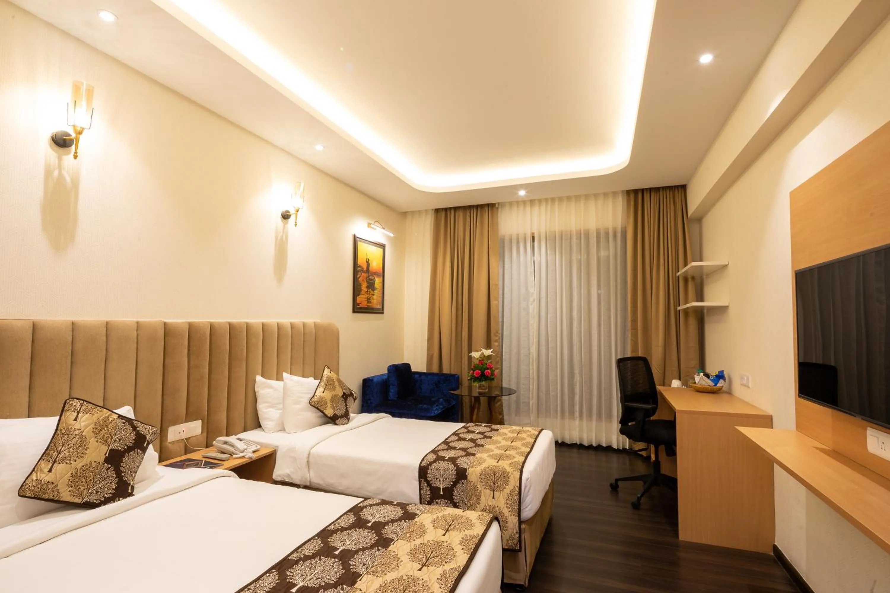 Bed in Goldfinch Hotel Mangalore