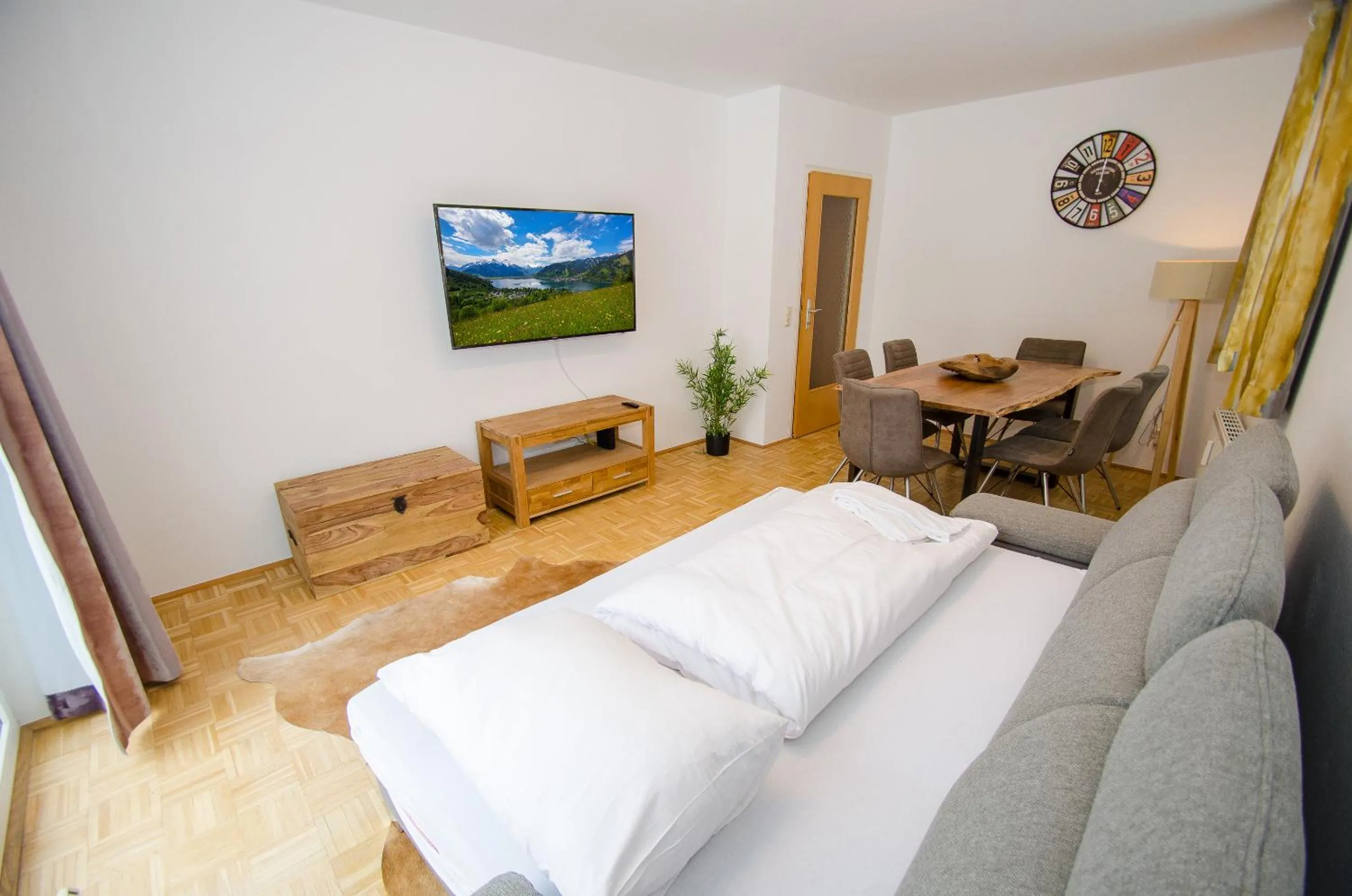 Living room, Bed in Apartments Summer & Winter Fun by All in One Apartments incl SUMMER CARD