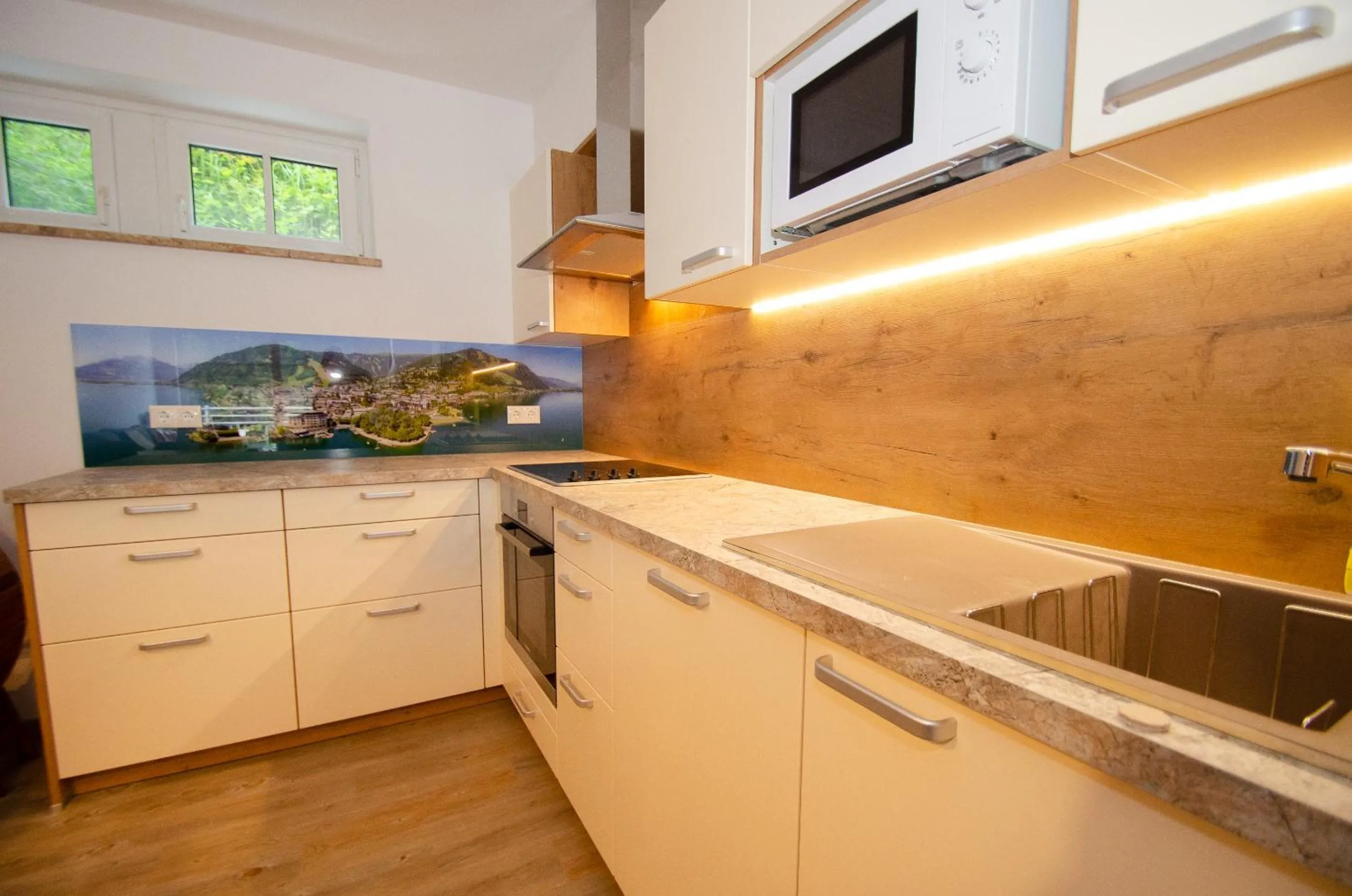 Kitchen or kitchenette in Apartments Summer & Winter Fun by All in One Apartments incl SUMMER CARD