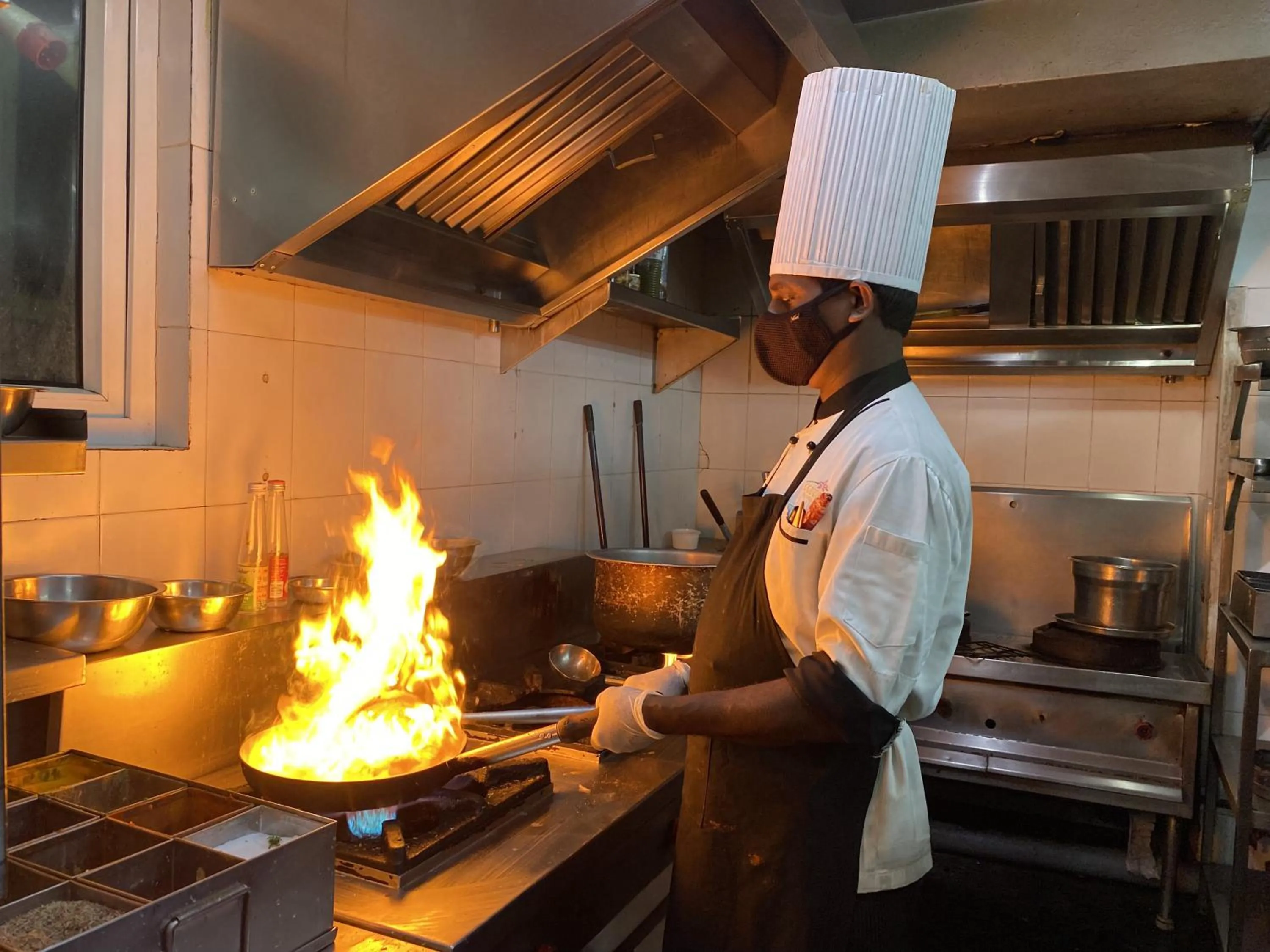Kitchen or kitchenette in Coraltree Hotel Bangalore