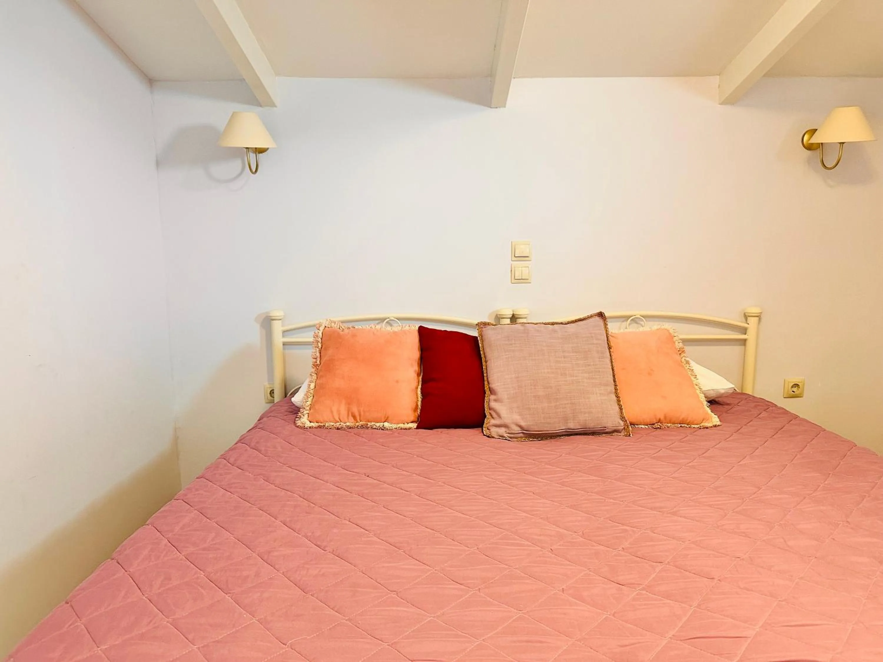 Bed in Infinity blue beach apartments - Renovated Apartments 2 Minutes from the Sea & Pool with Scenic Views