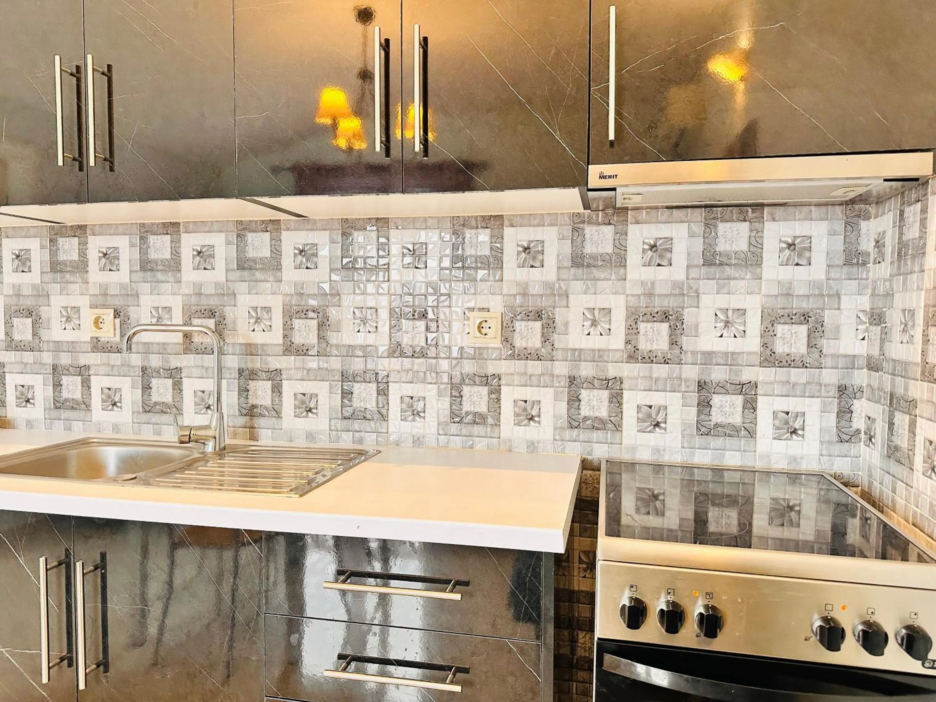 Kitchen or kitchenette in Infinity blue beach apartments - Renovated Apartments 2 Minutes from the Sea & Pool with Scenic Views