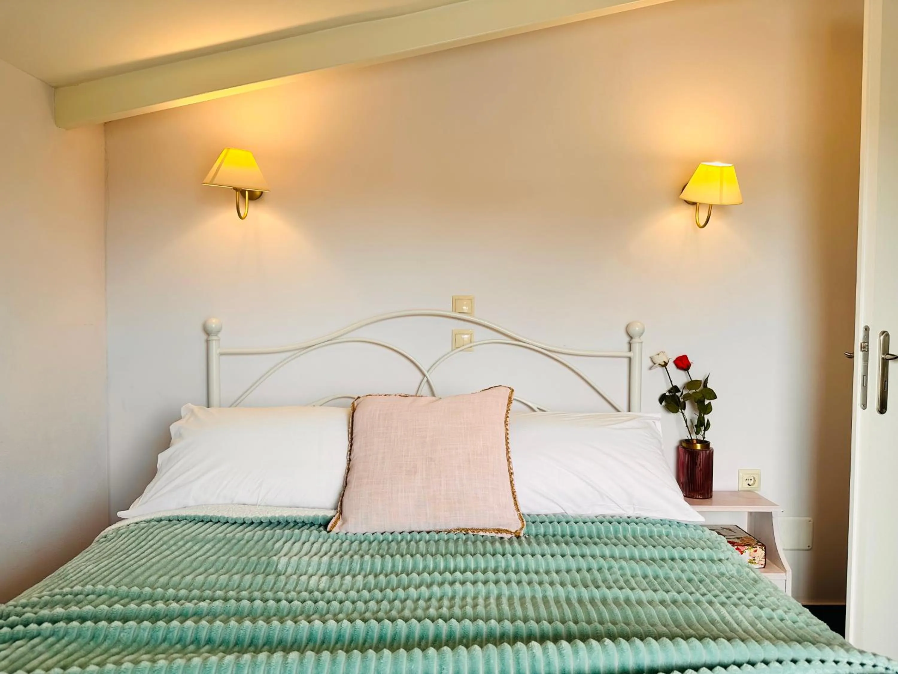 Bed in Infinity blue beach apartments - Renovated Apartments 2 Minutes from the Sea & Pool with Scenic Views