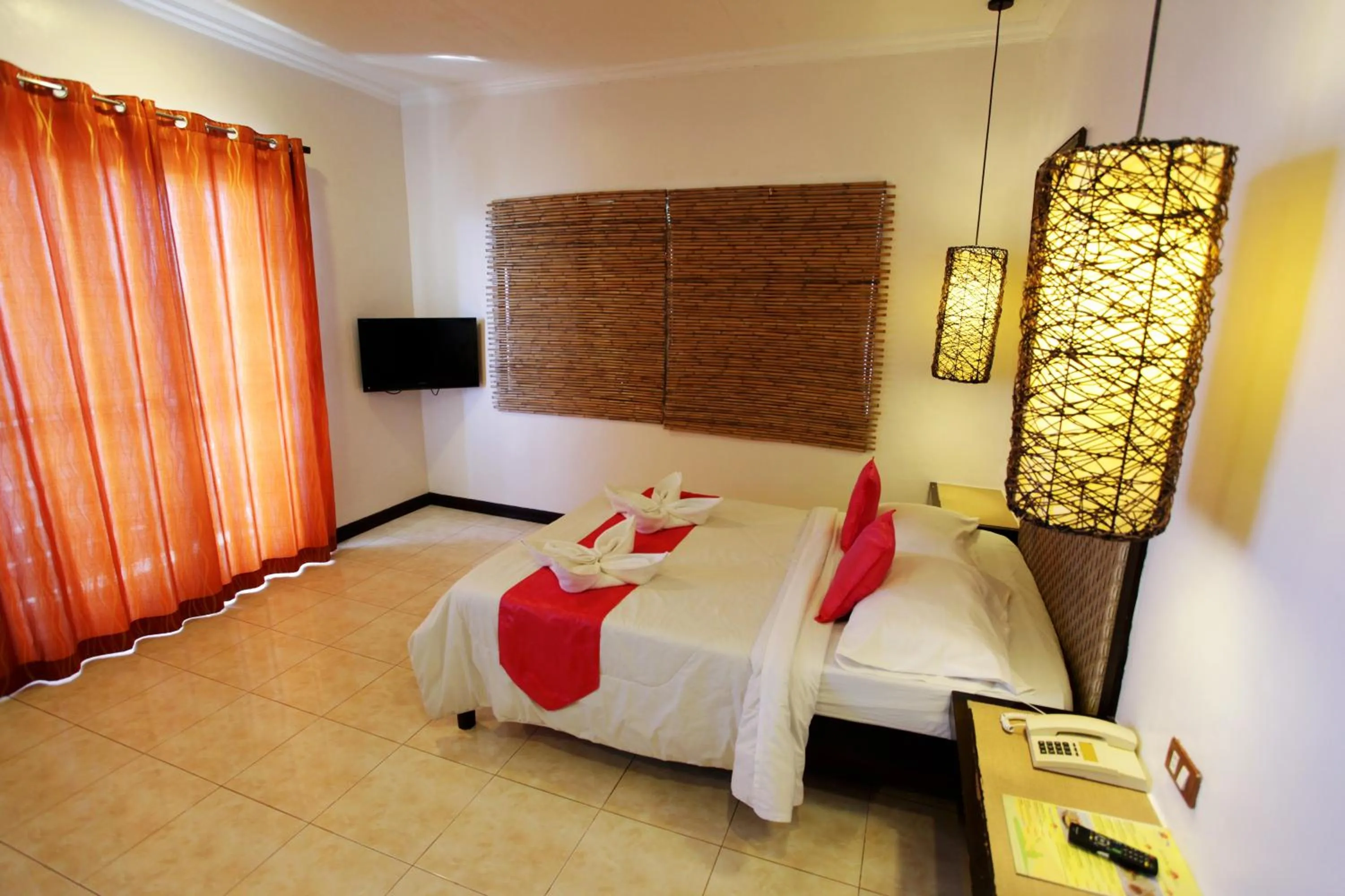 Bed in Eagle Point Beach and Dive Resort