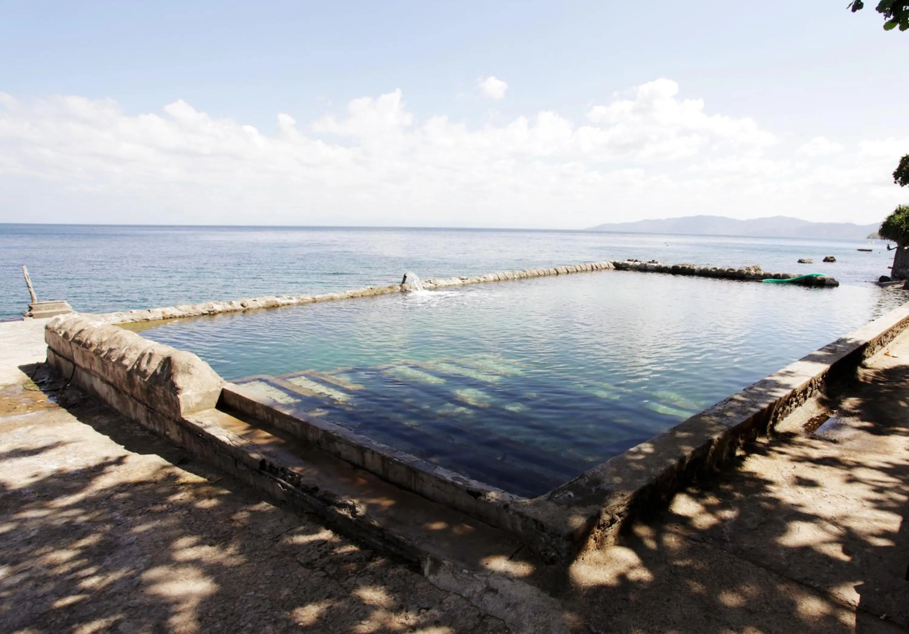Swimming pool in Eagle Point Beach and Dive Resort
