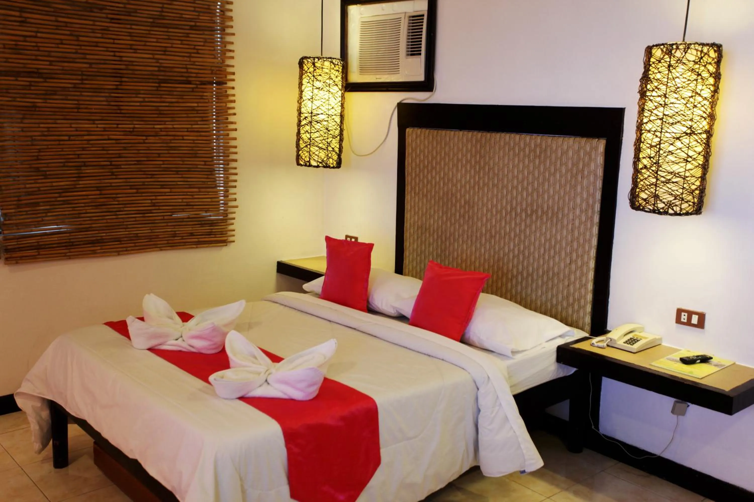 Bed in Eagle Point Beach and Dive Resort