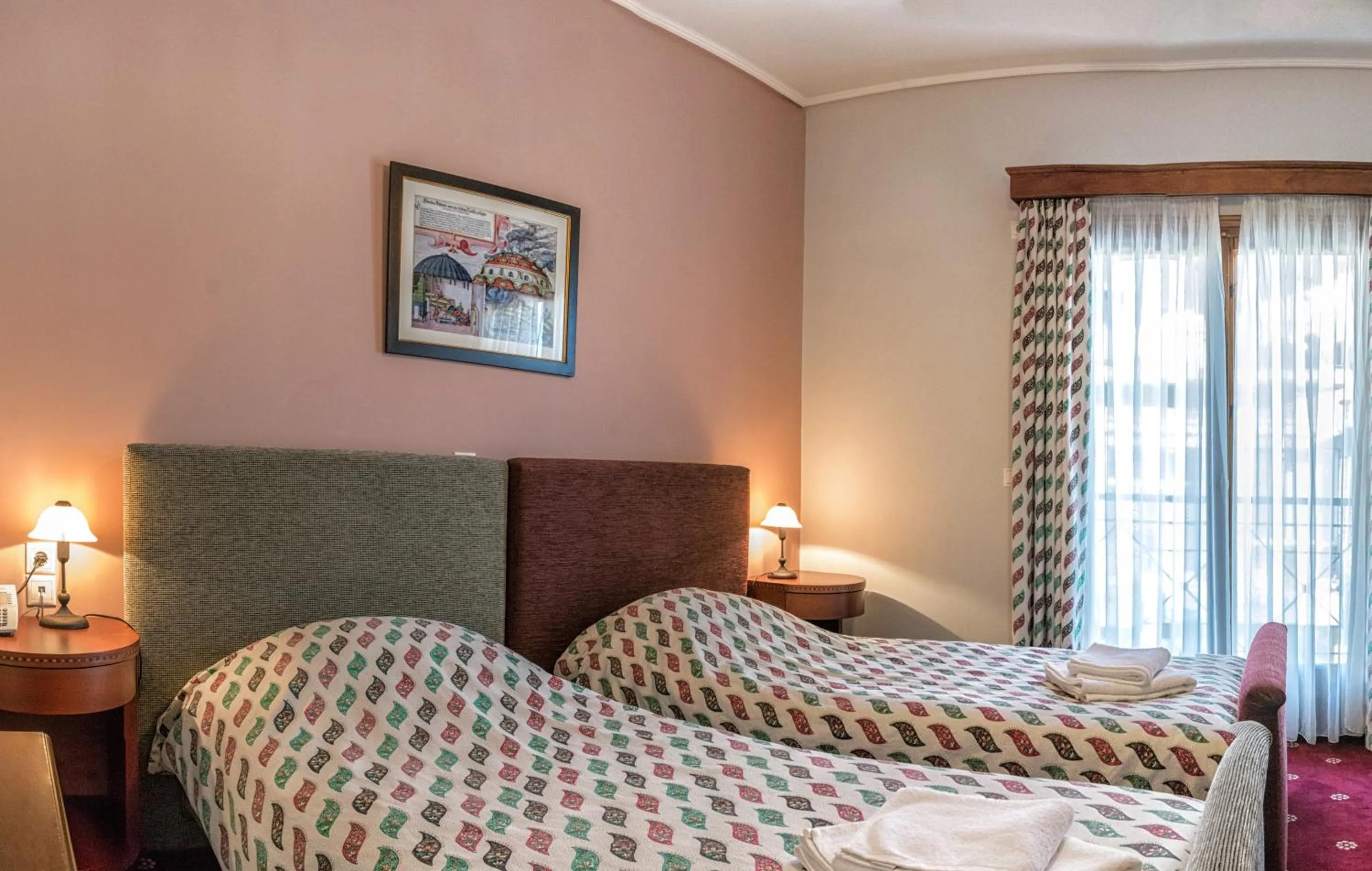 Bed in City Hotel Apollonion