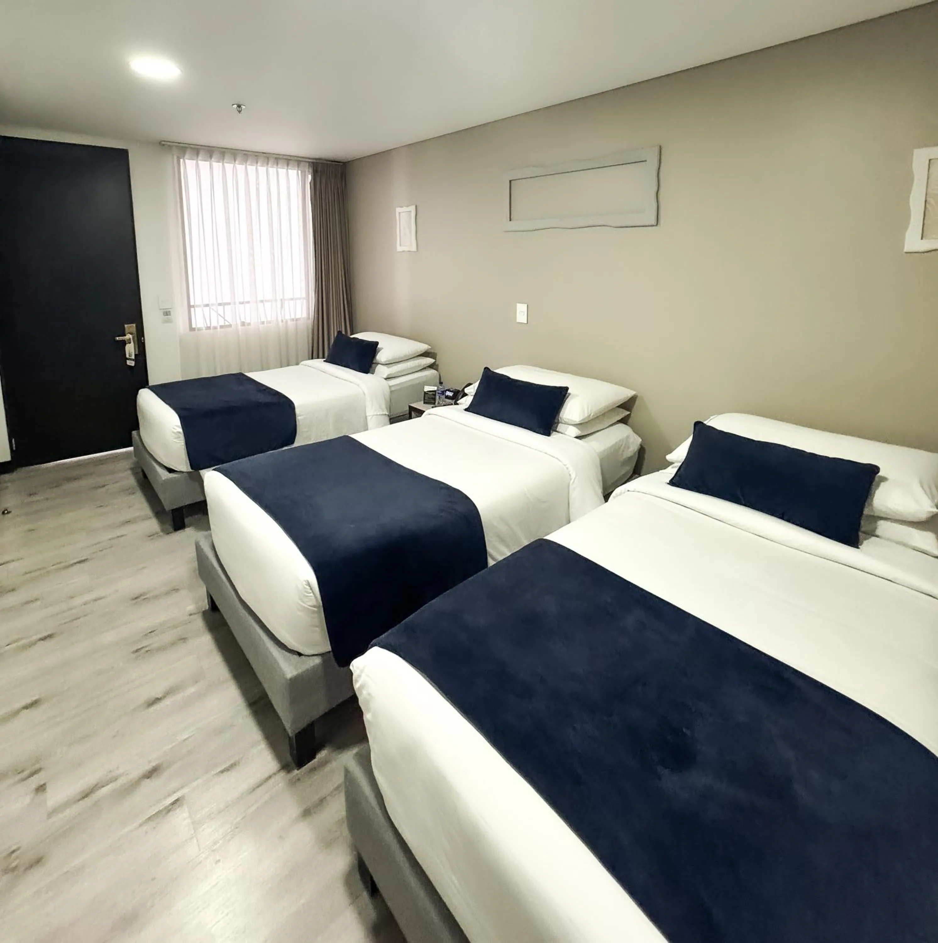 Bed in Hotel WLH Silver Bogota - White Lighthouse