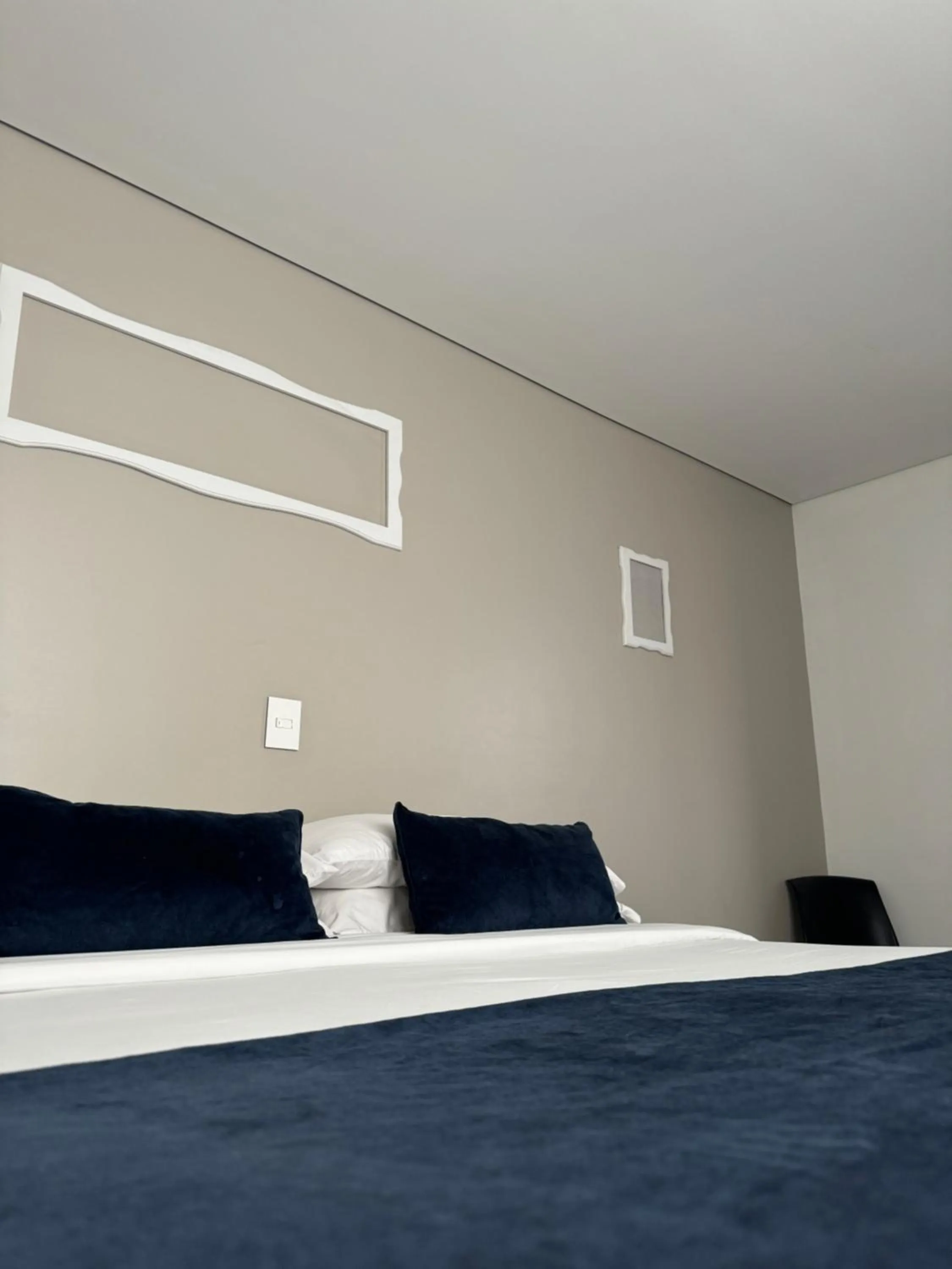 Bed in Hotel WLH Silver Bogota - White Lighthouse