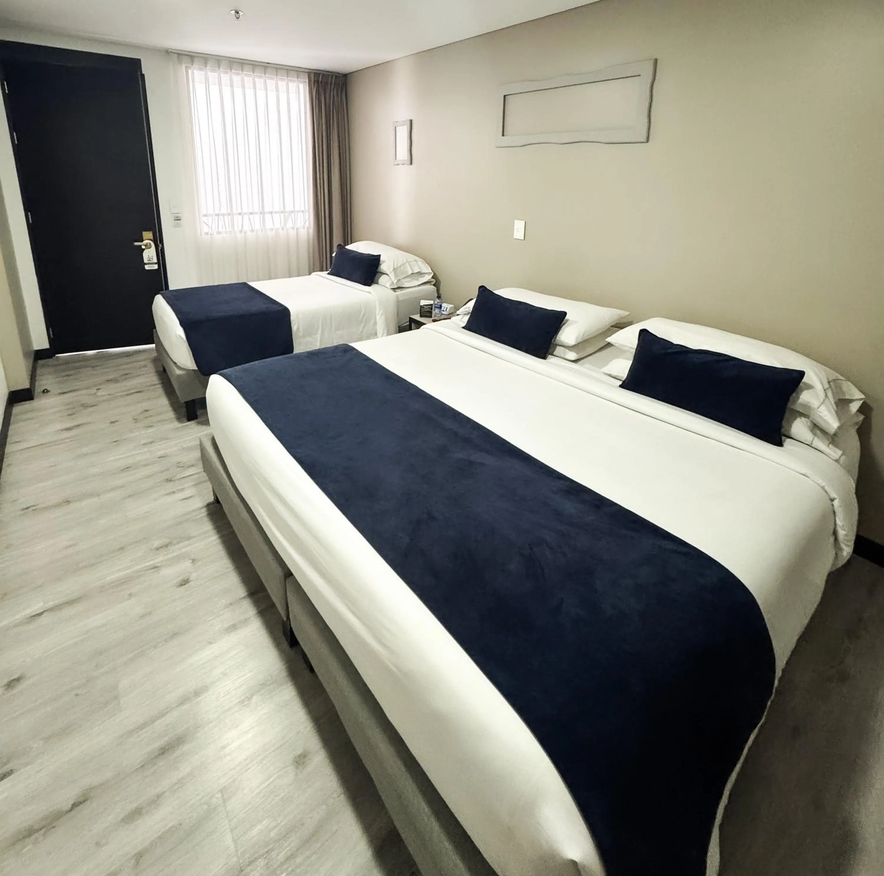 Bed in Hotel WLH Silver Bogota - White Lighthouse